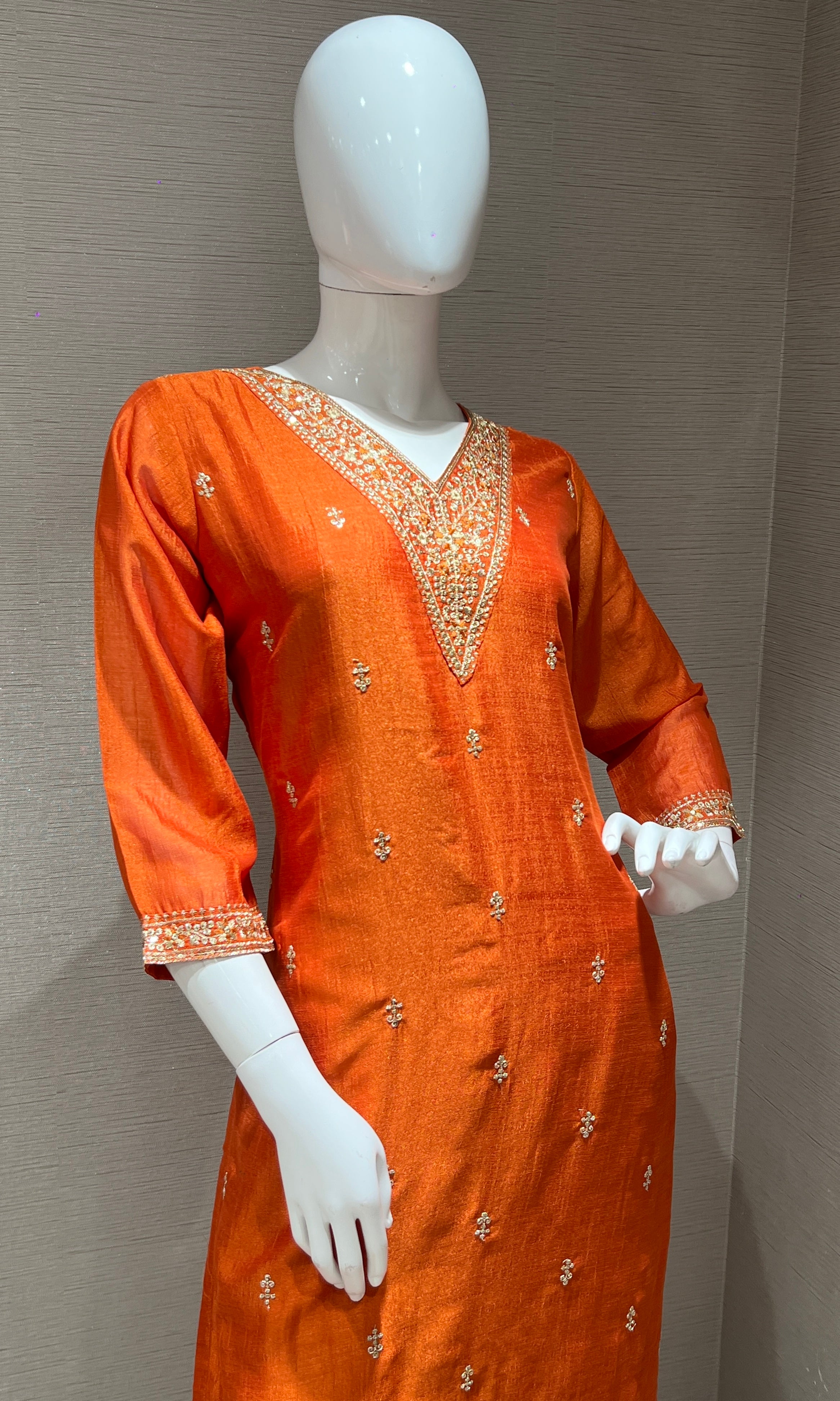 orange kurta set with contrast gold duppatta