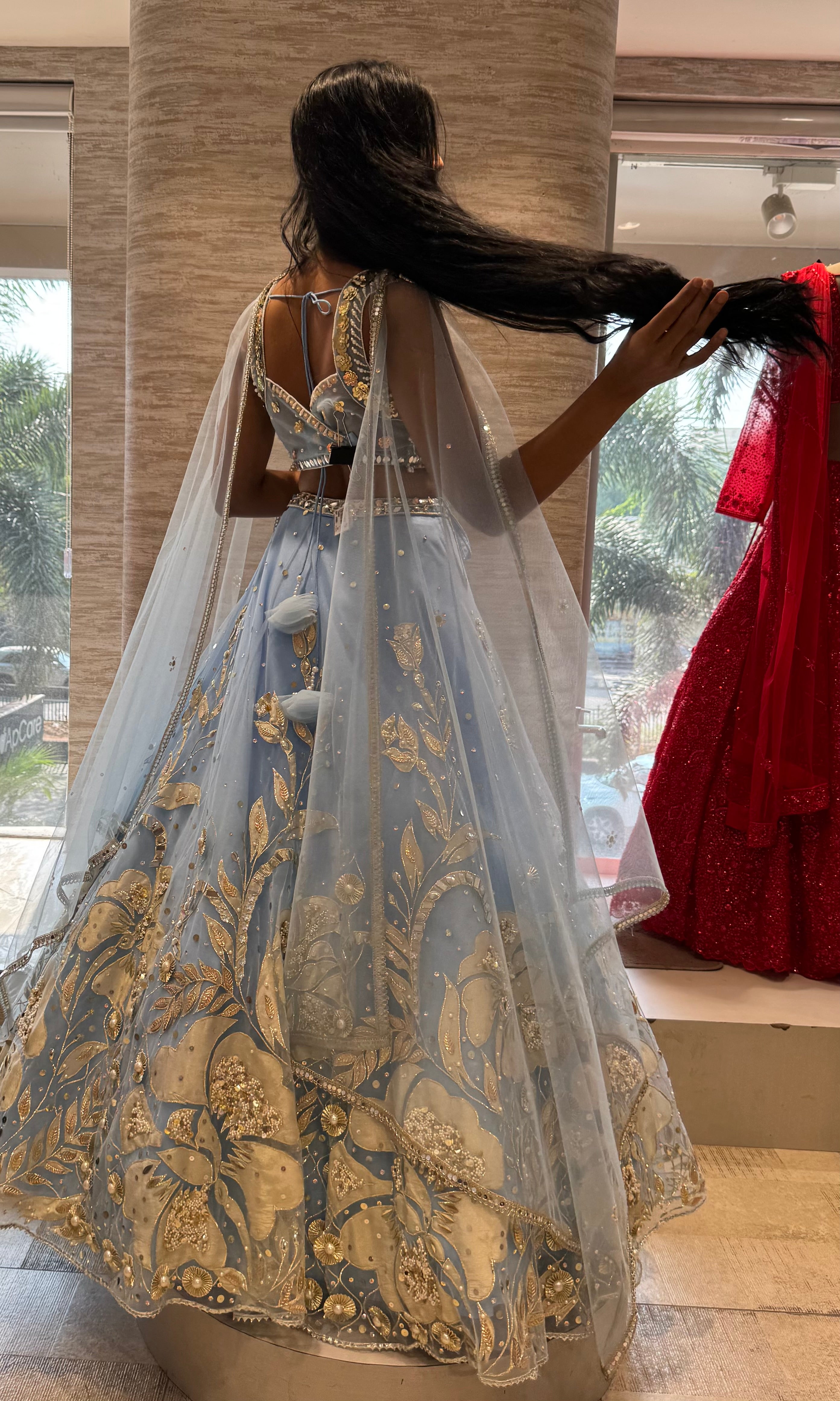 Light blue heavy gold embroidery lehenga