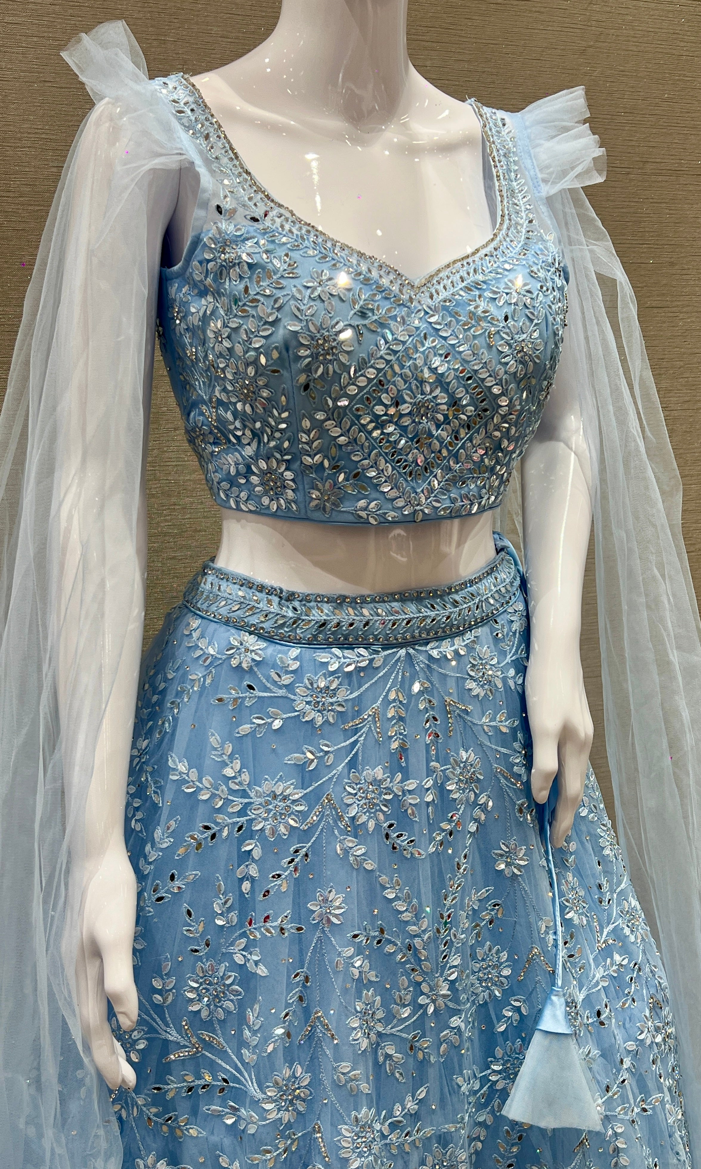 Aarvi β Sky Blue Net Embroidered Lehenga Set