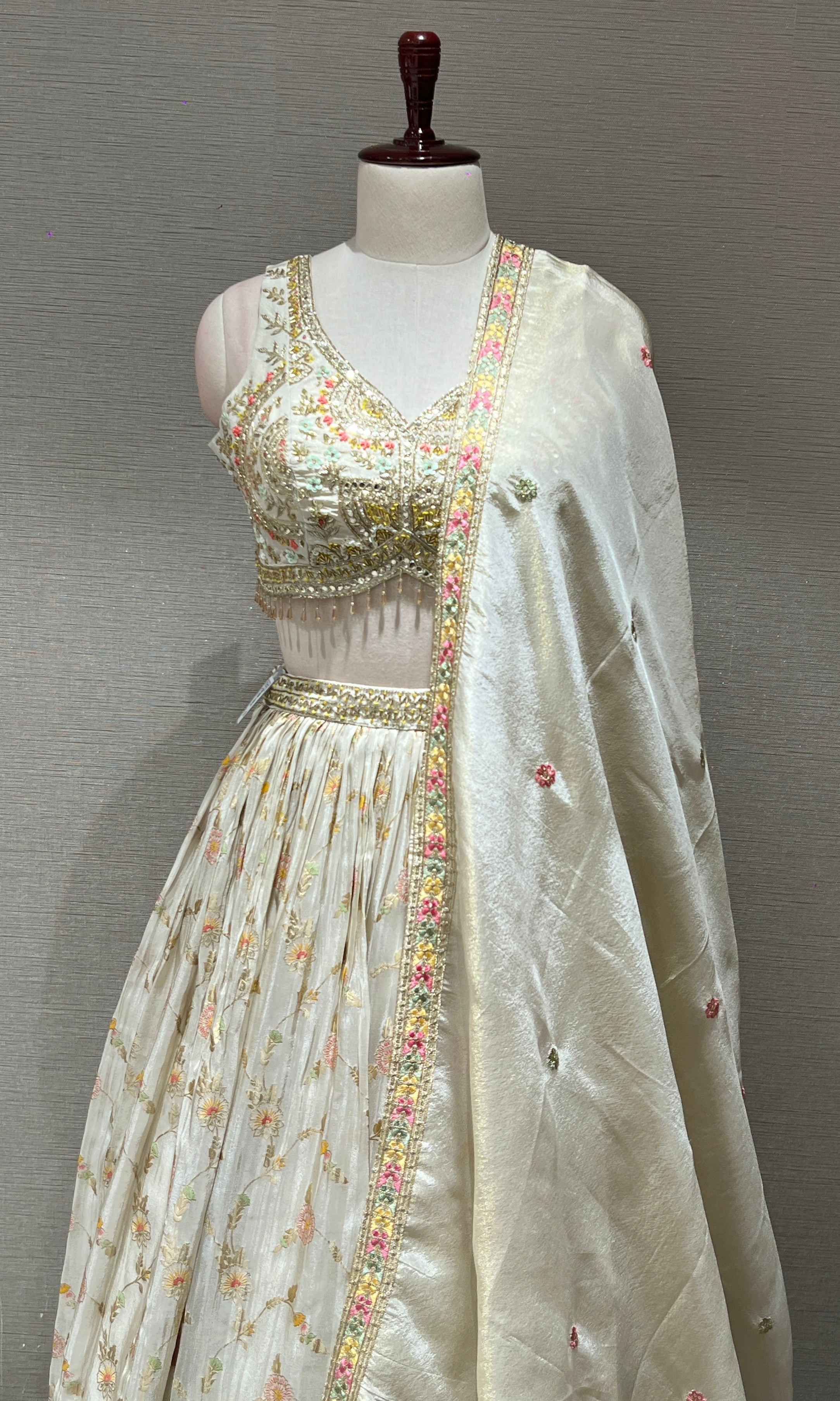 Half white Floral embroidred Lehenga with Golden Border