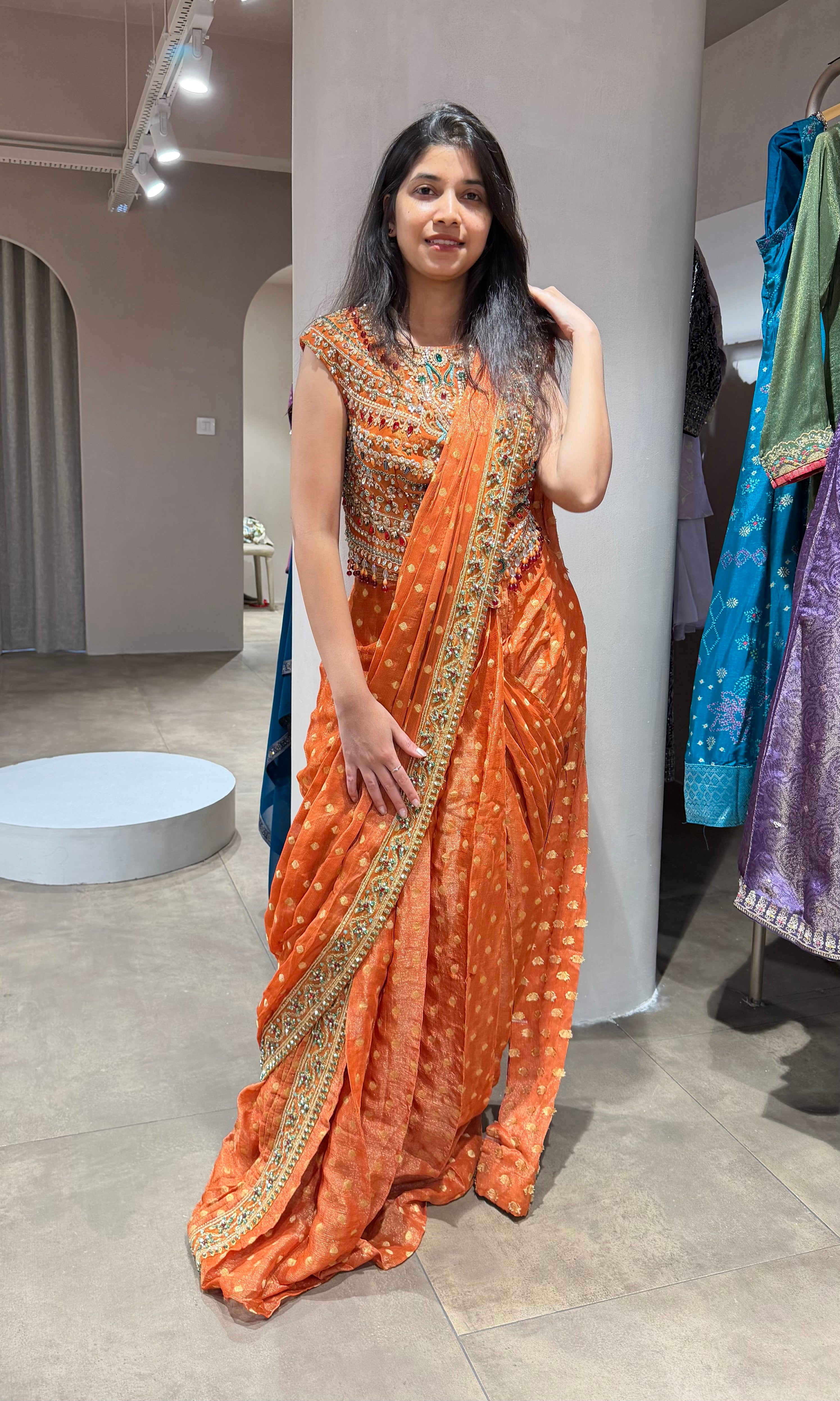 Orange INTRICATE EMBROIDERED drape saree