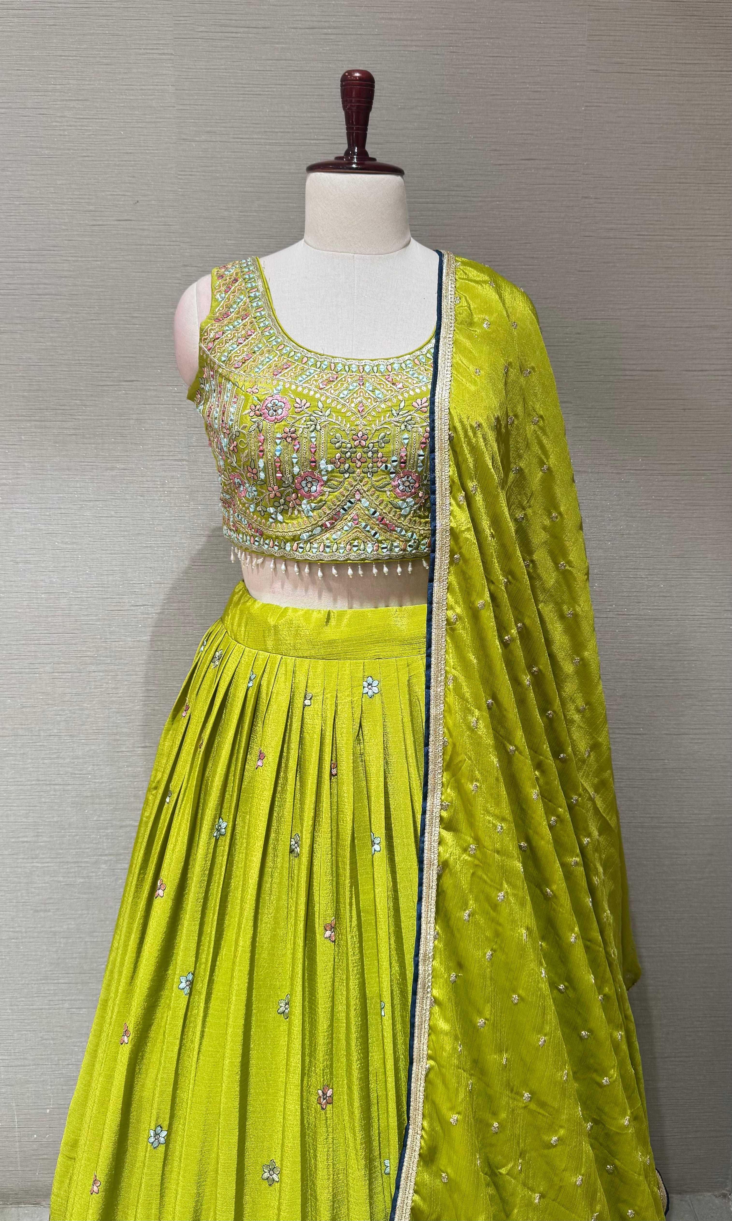 Green Tissue silk lehenga set with intricate floral embroidery