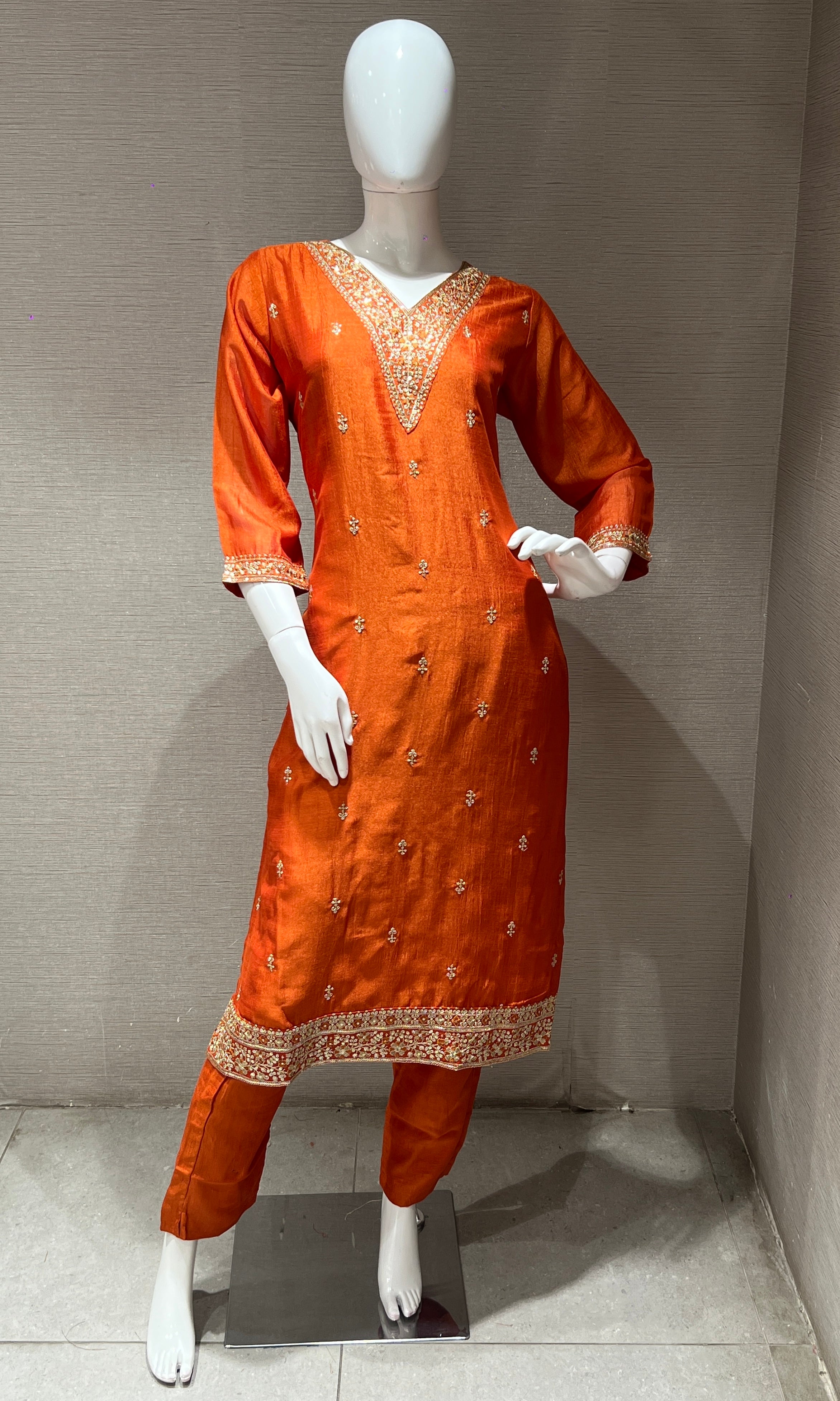 orange kurta set with contrast gold duppatta