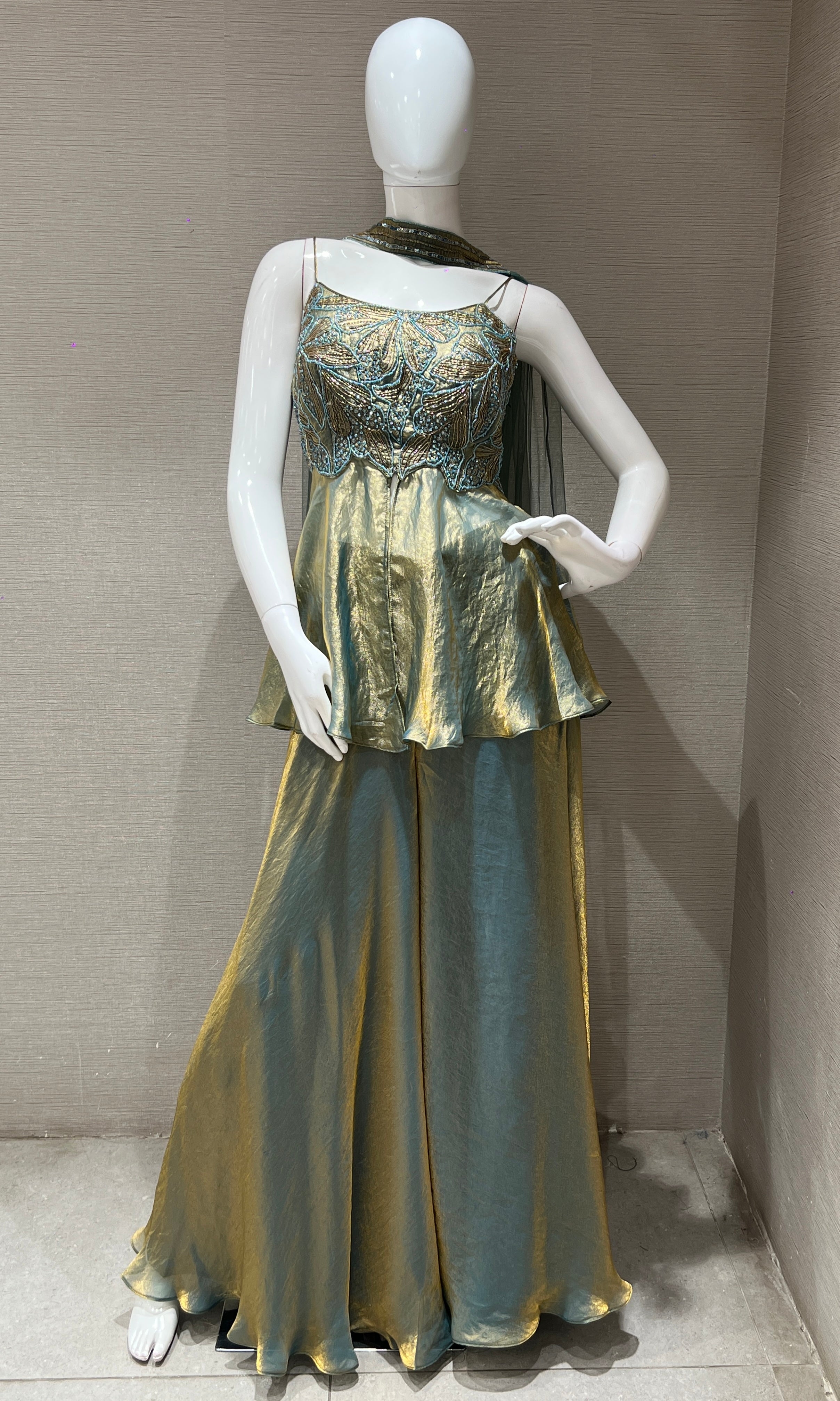 metallic green and blue palazzo with peplum top