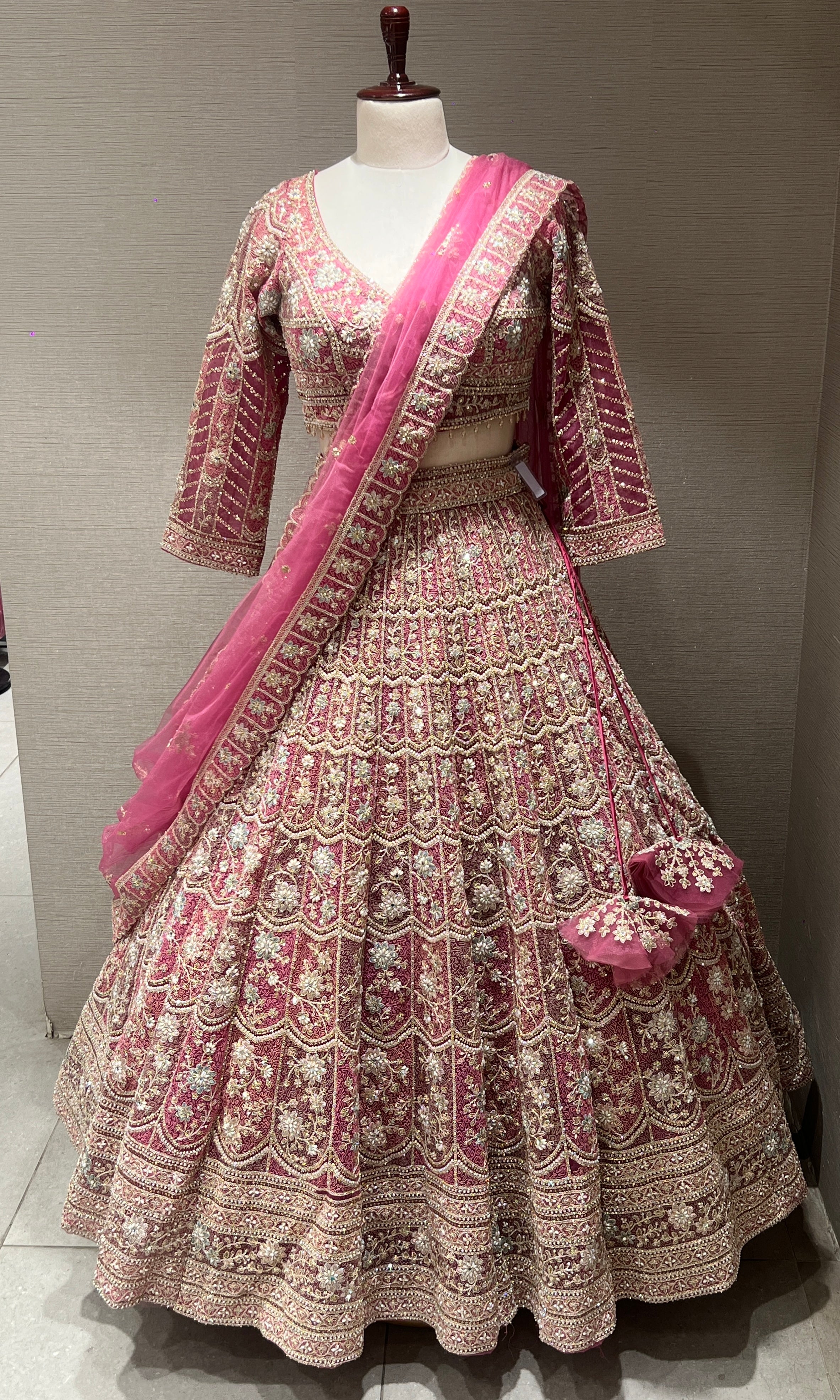 Pink lehenga with intricate embroidery and zari work