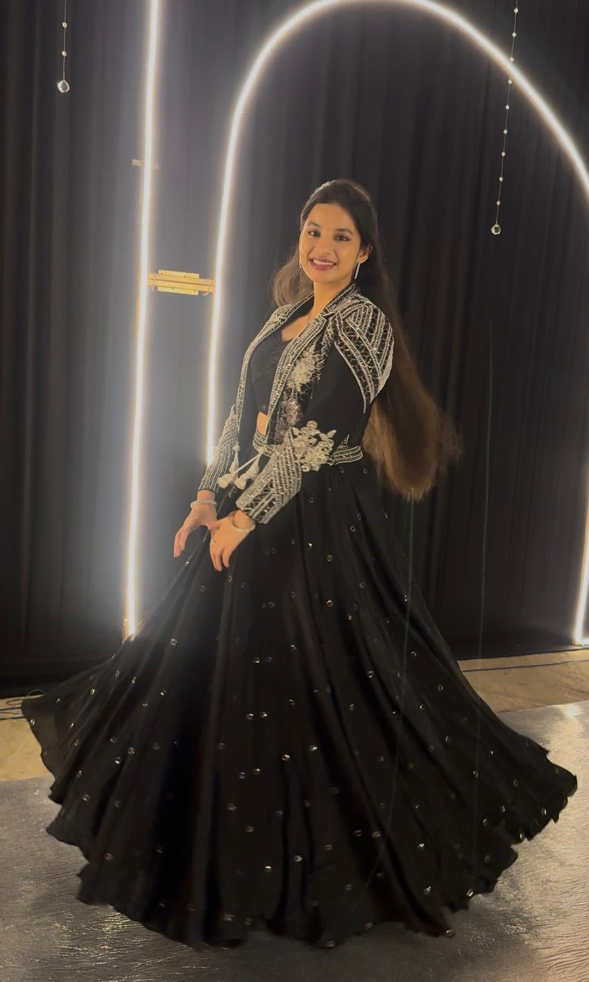 Black lehenga with corset blouse and jacket