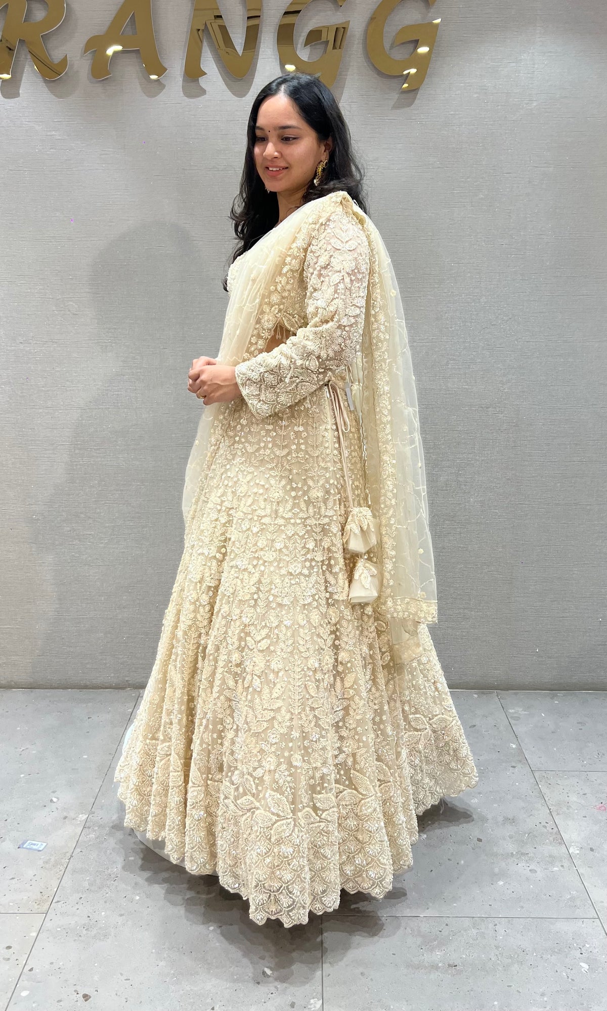 Cream soft net intricate floral Embroidery bridal lehenga