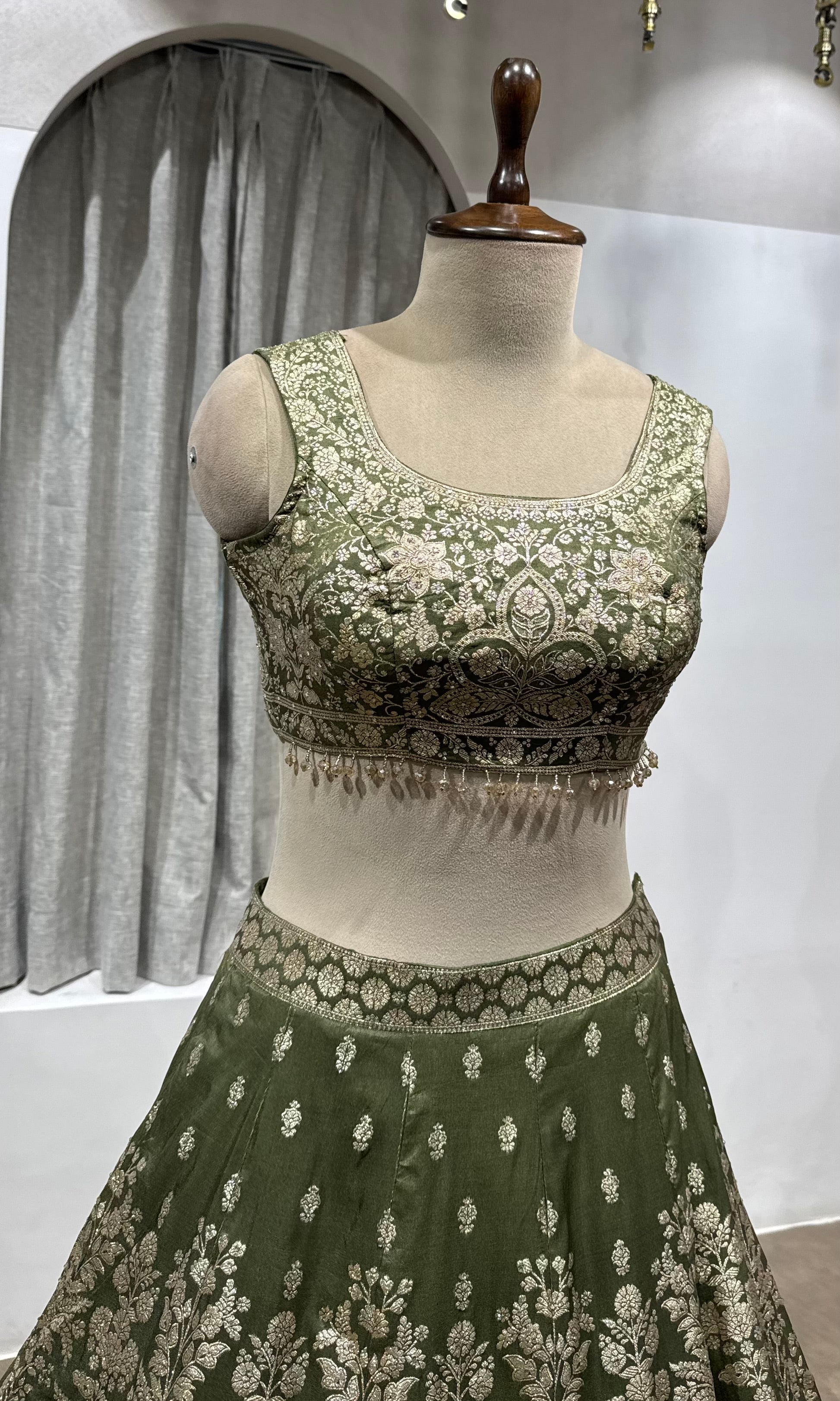 Mehendi Green Net Cord Embroidery Lehenga