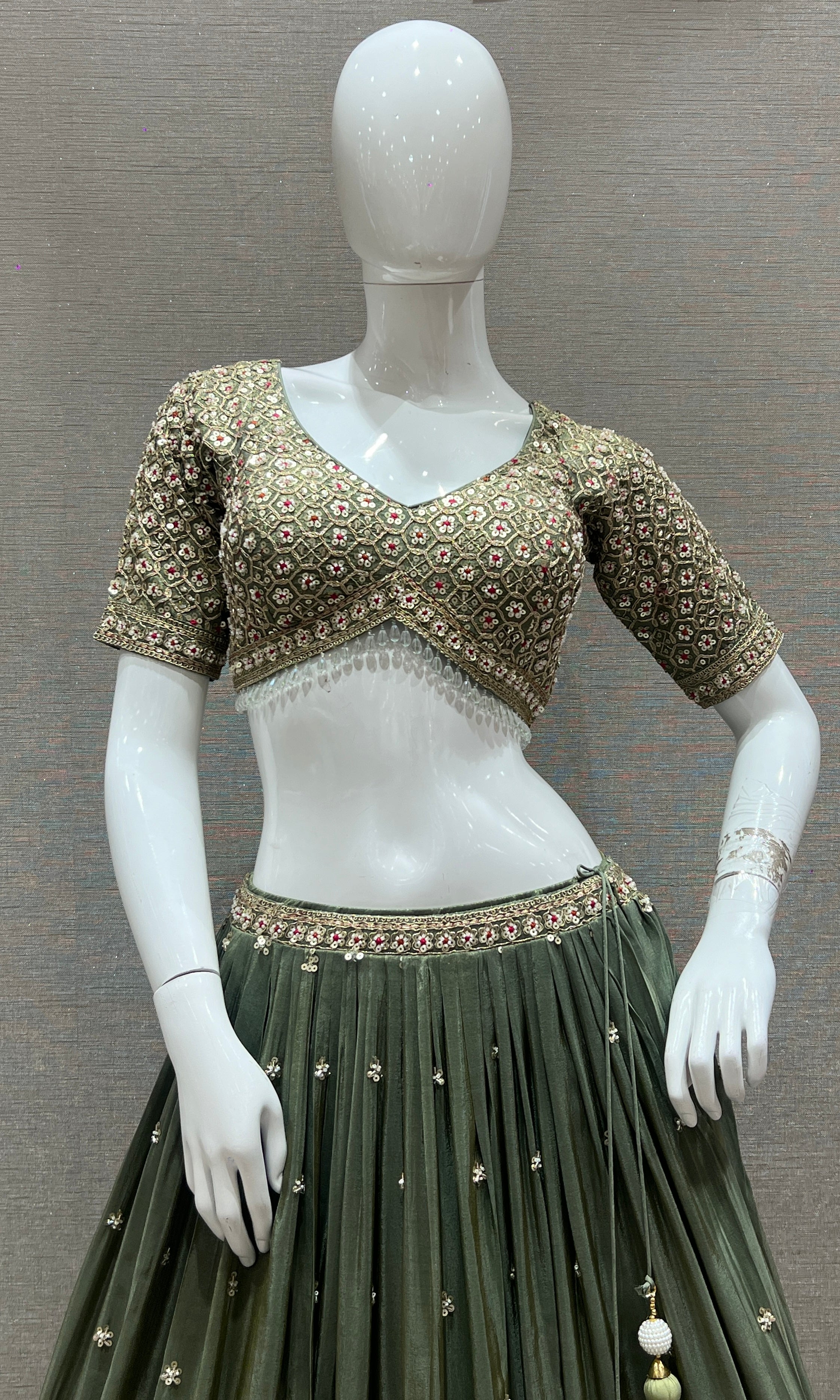 Vanika Sitara - Sage Green Lehenga with Floral & Gold Thread Work Embellishments