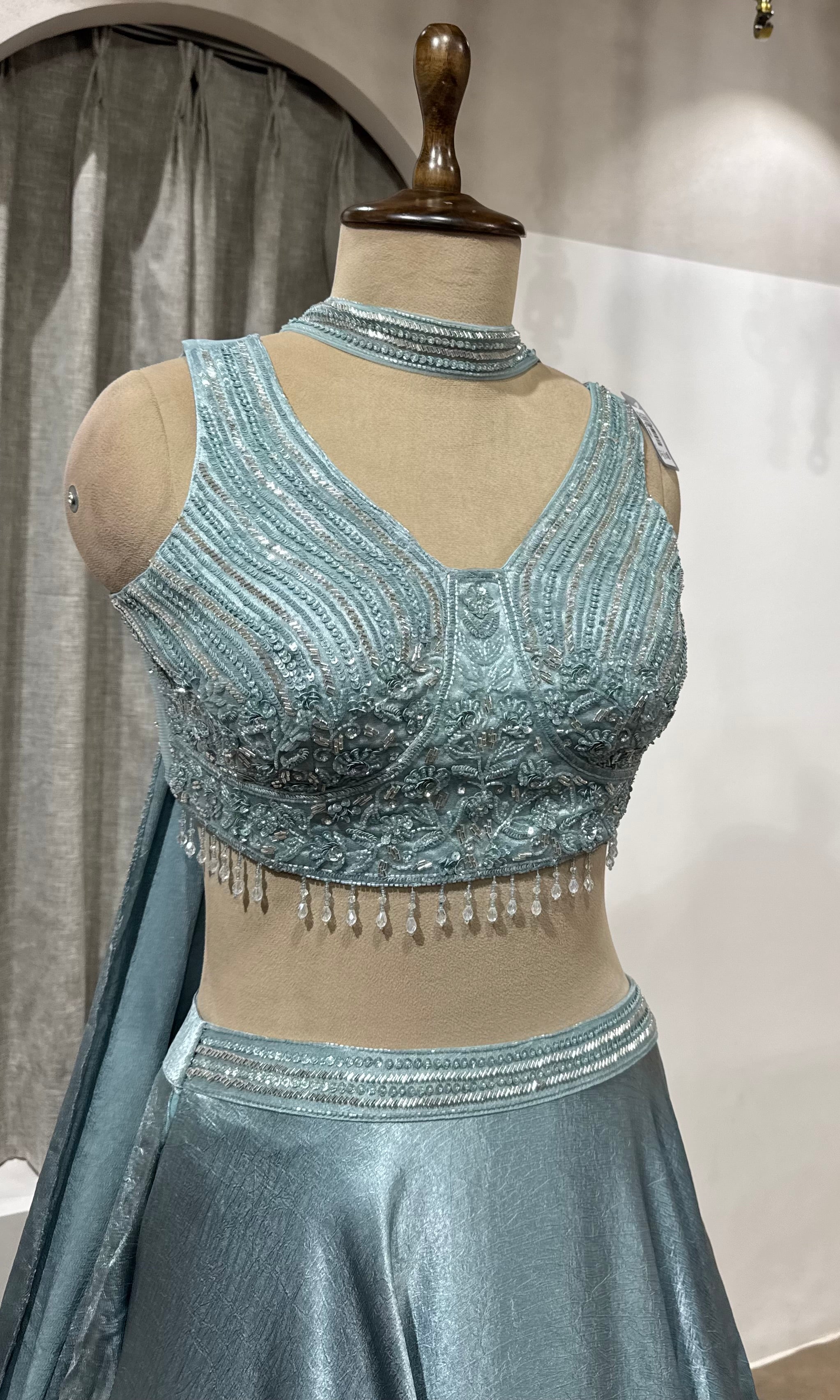 Sea green Lehenga with embroidered corset blouse