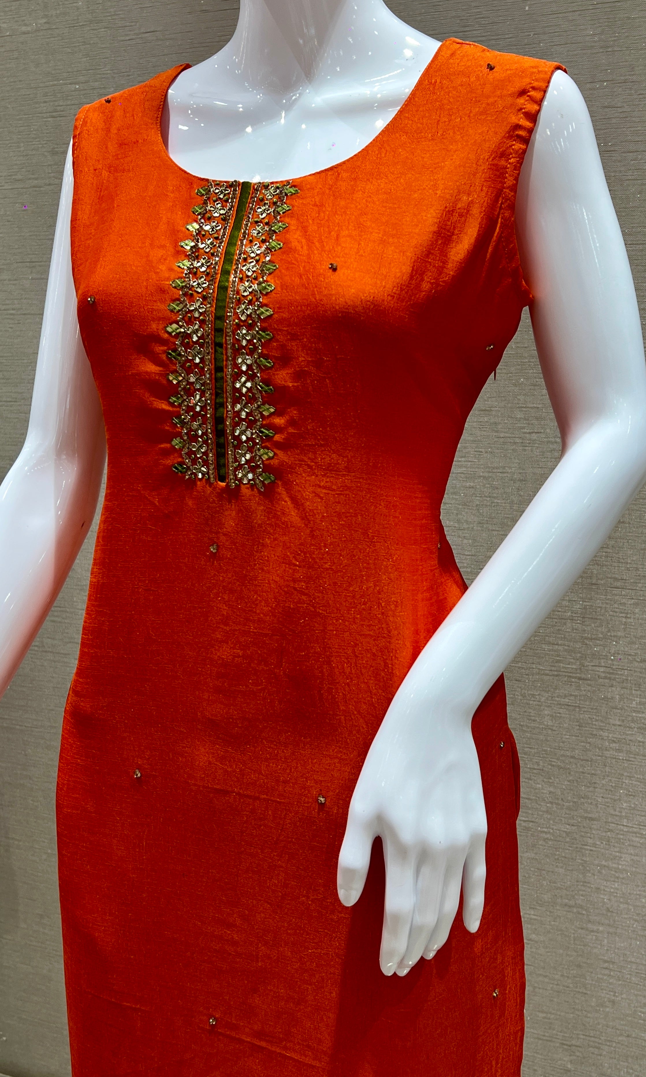 Orange kurta set with green Contrast dupatta