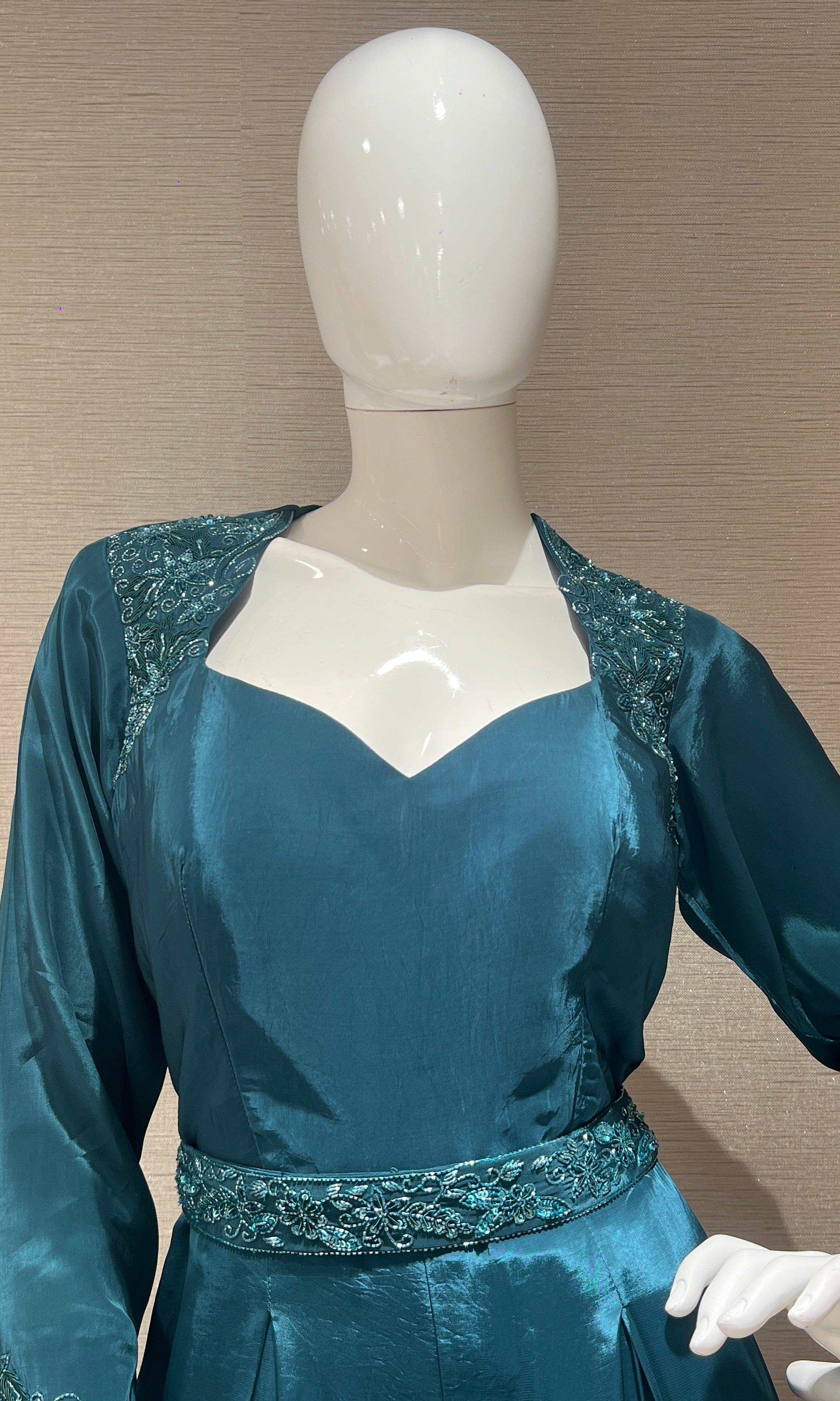 Green jumpsuit with belt