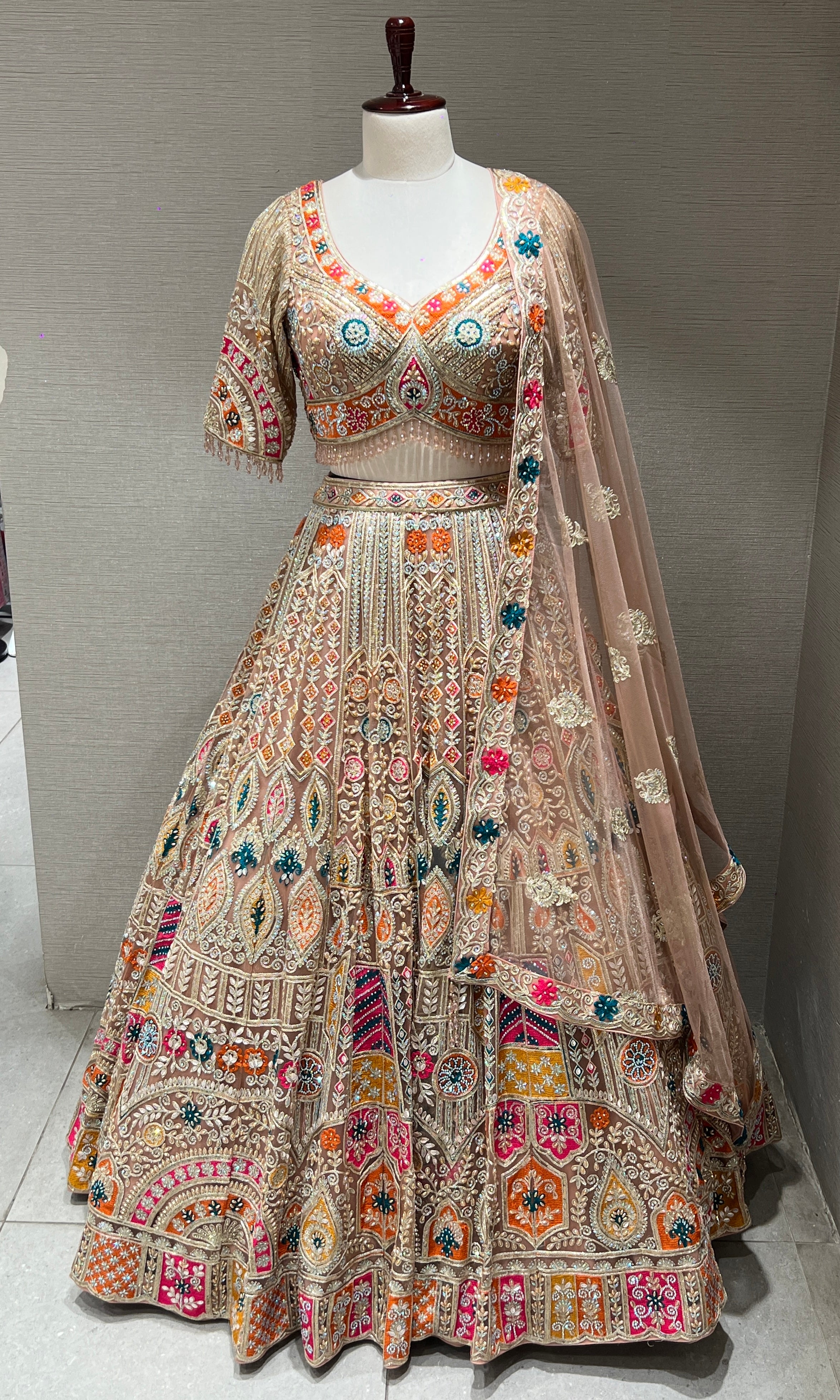Peach Lehenga with Sequin and stone embellishments
