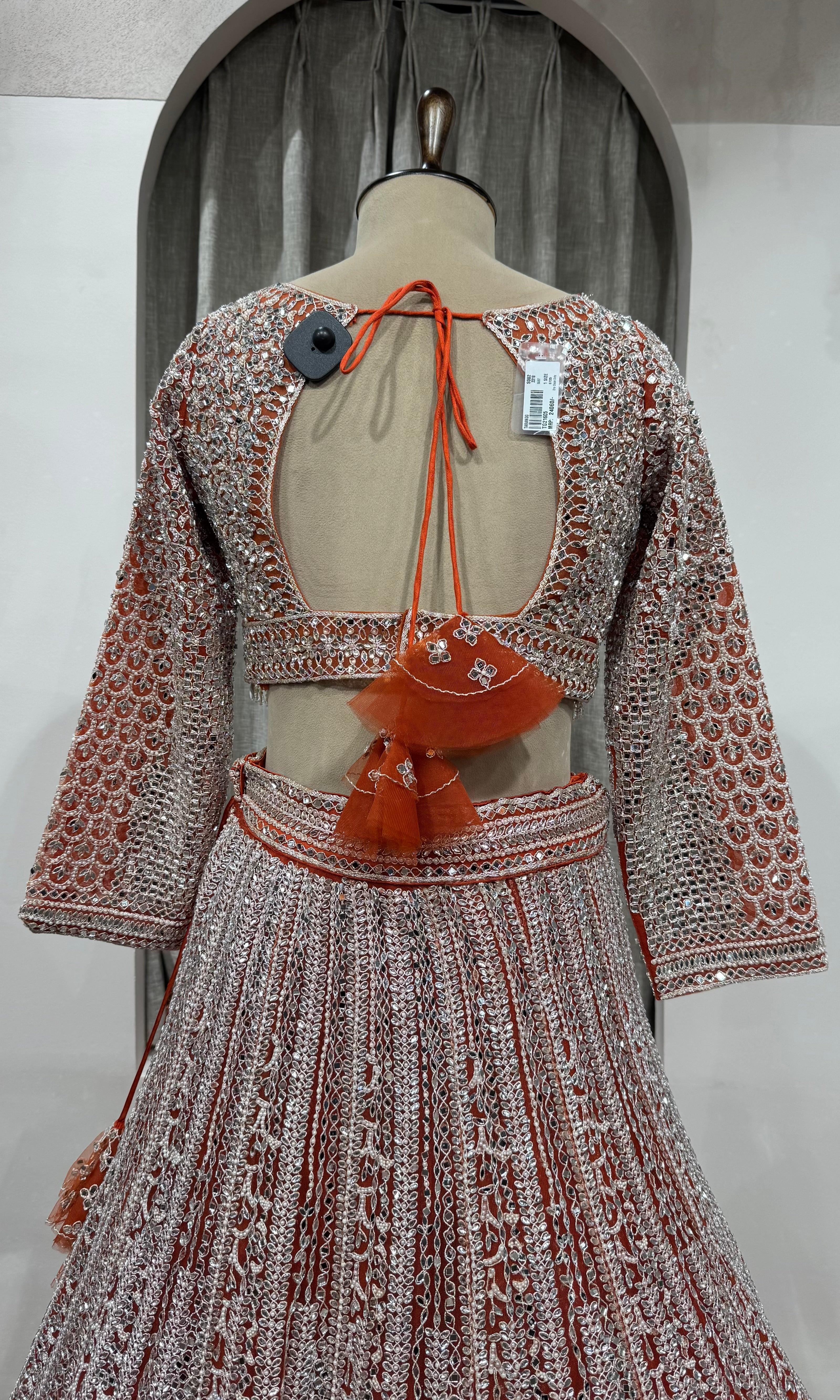 Rust and grey heavy bridal lehenga