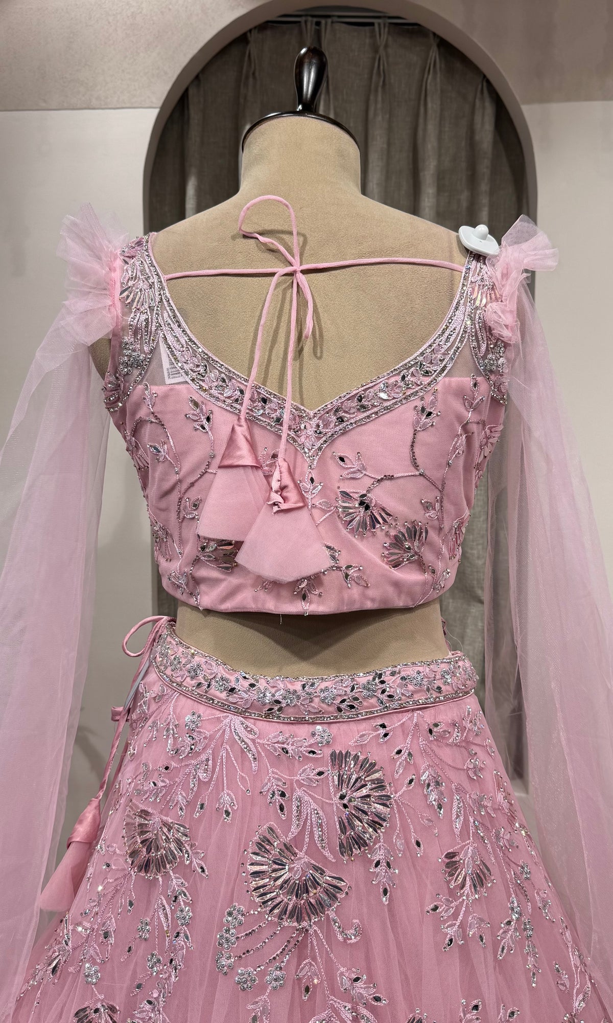 pink floral embroidered net crop top lehenga