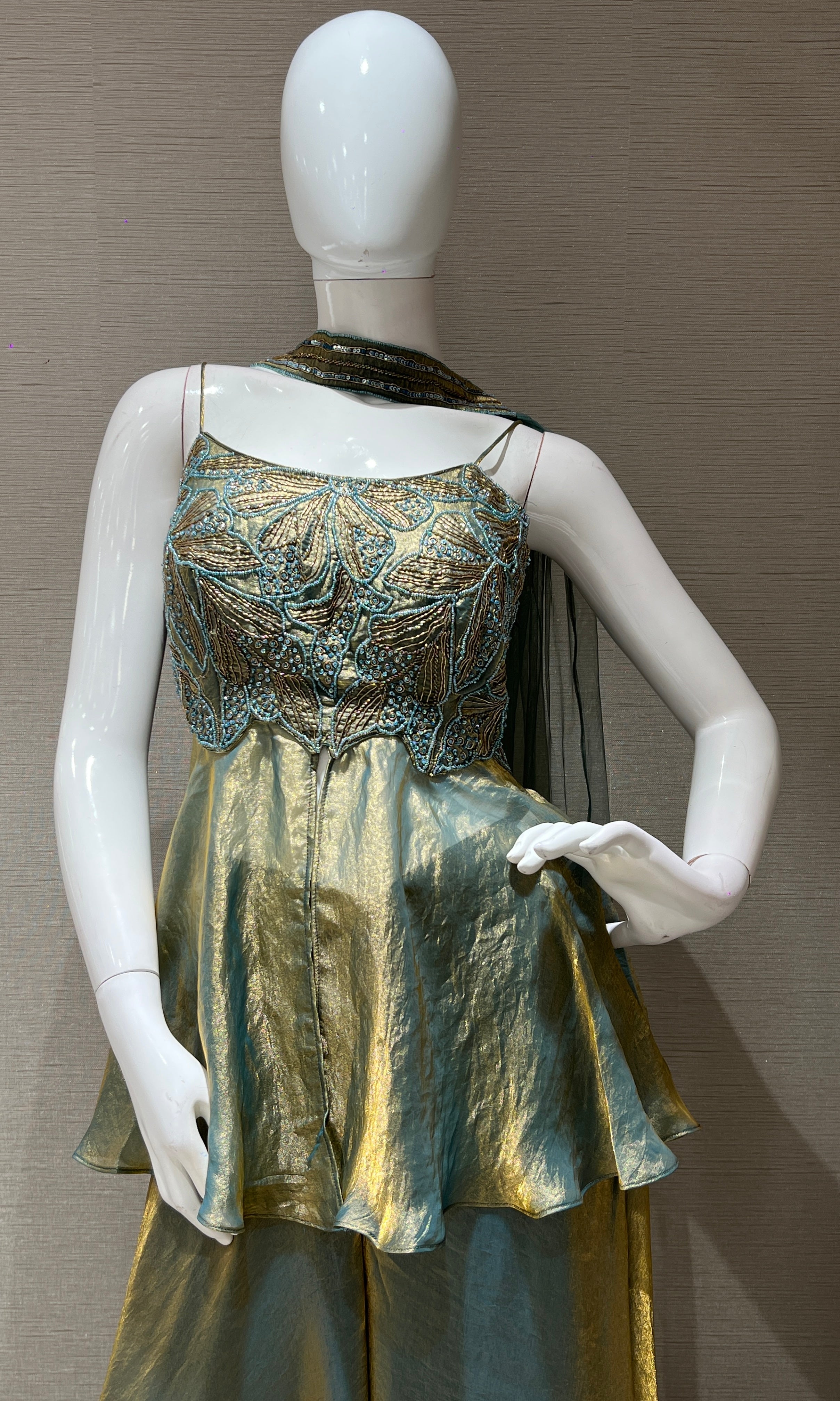 metallic green and blue palazzo with peplum top