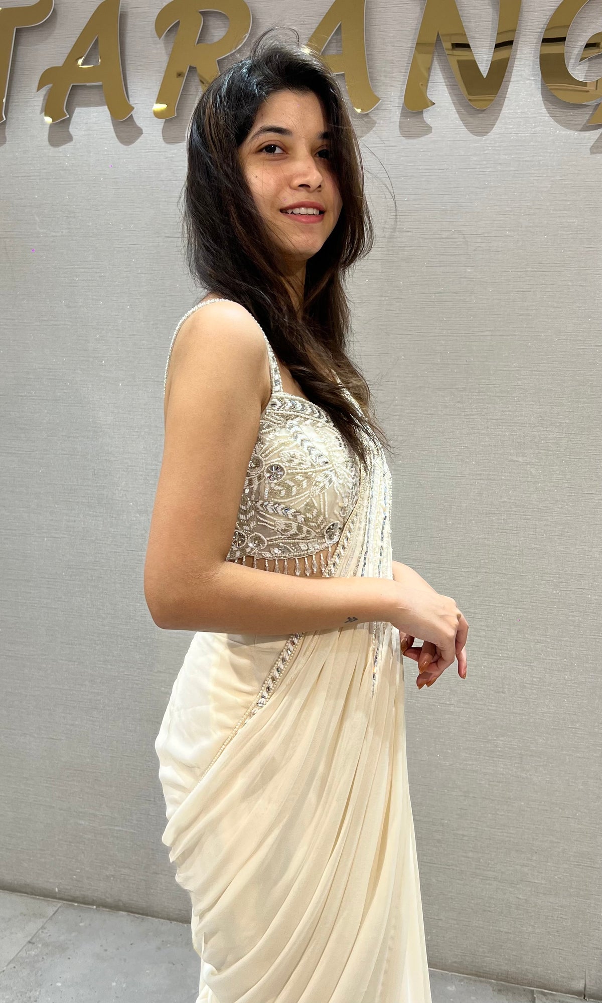 Ivory silk Draped Saree with Embellished Corset Blouse