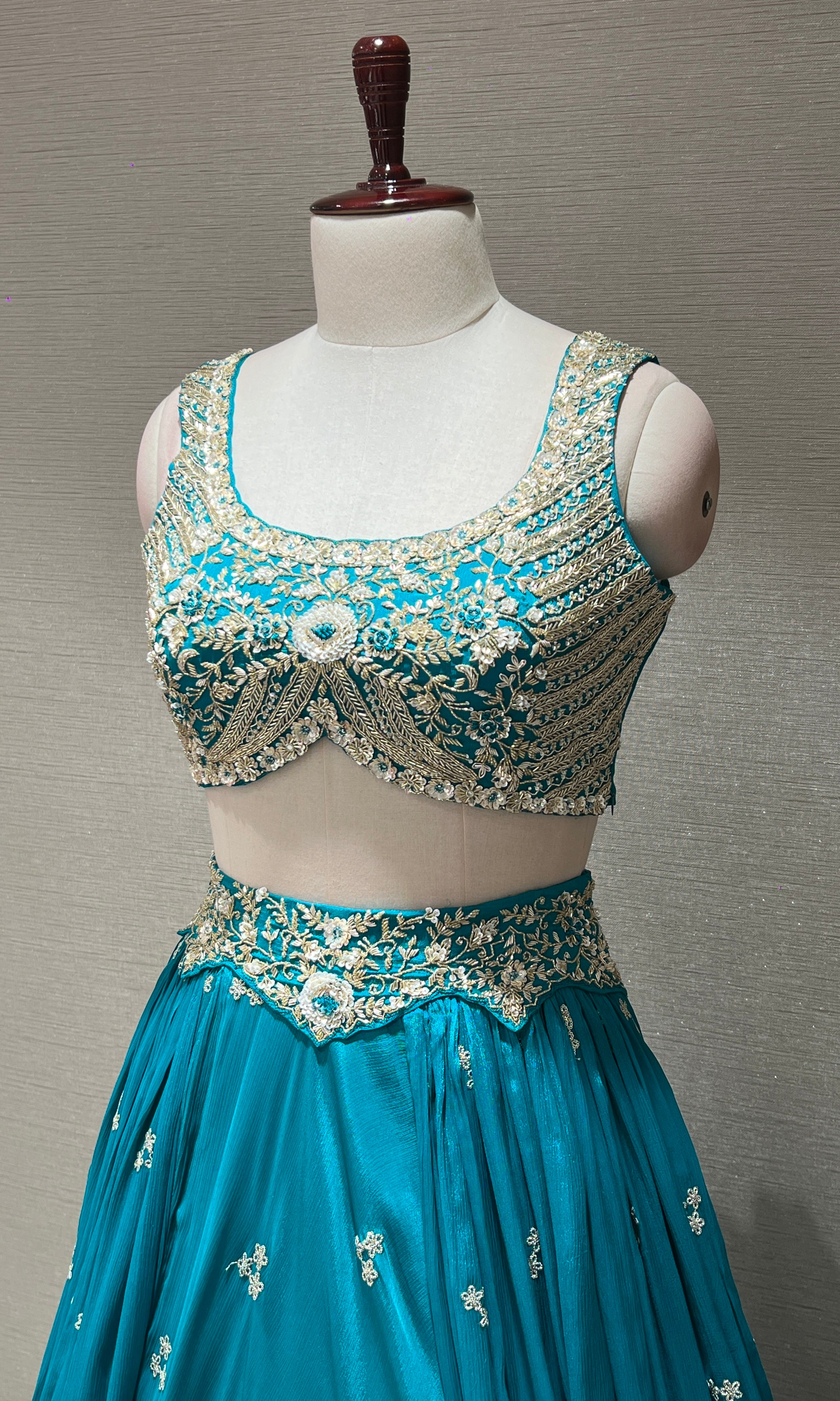 Teal blue gold zari embroidered lehenga