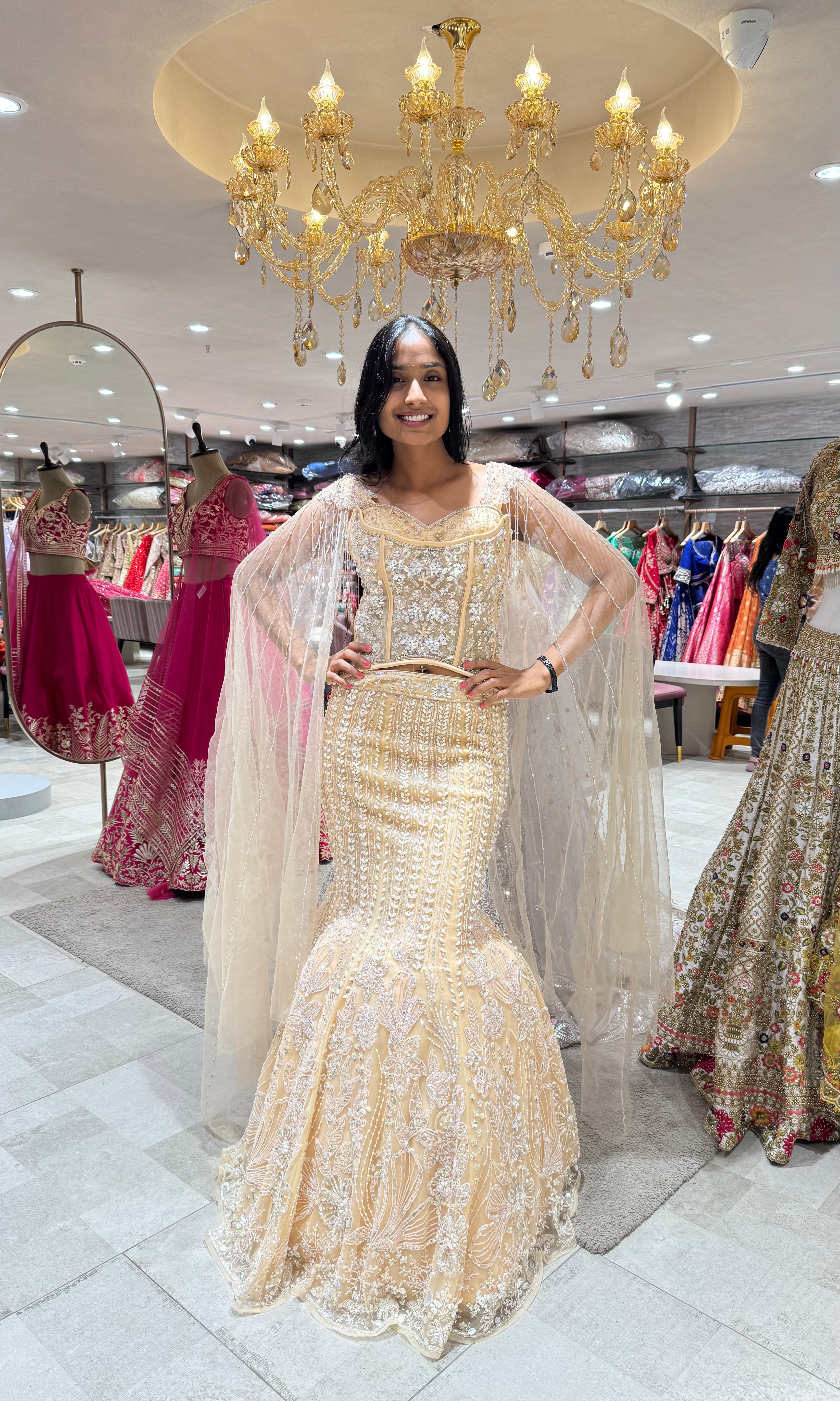 GOLD LEHENGA WITH CORSET BLOUSE & CAPE