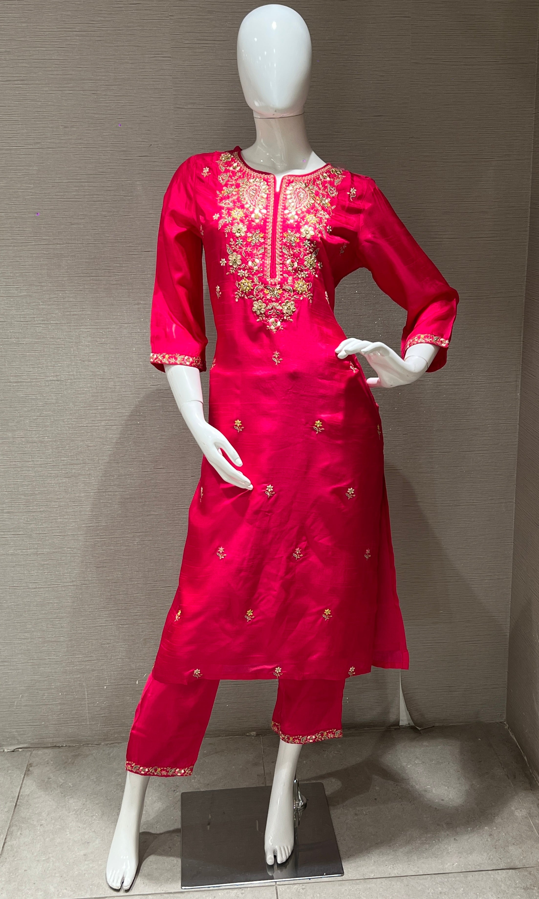 Pink kurta set with a yellow dupatta