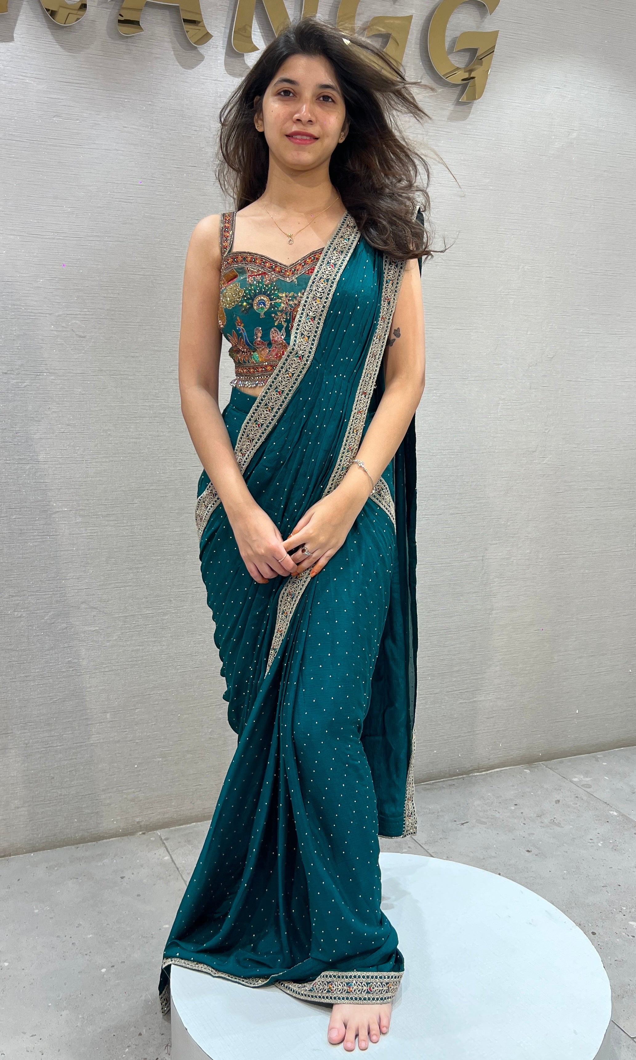 Rama green drape Saree with Intricate Floral Blouse