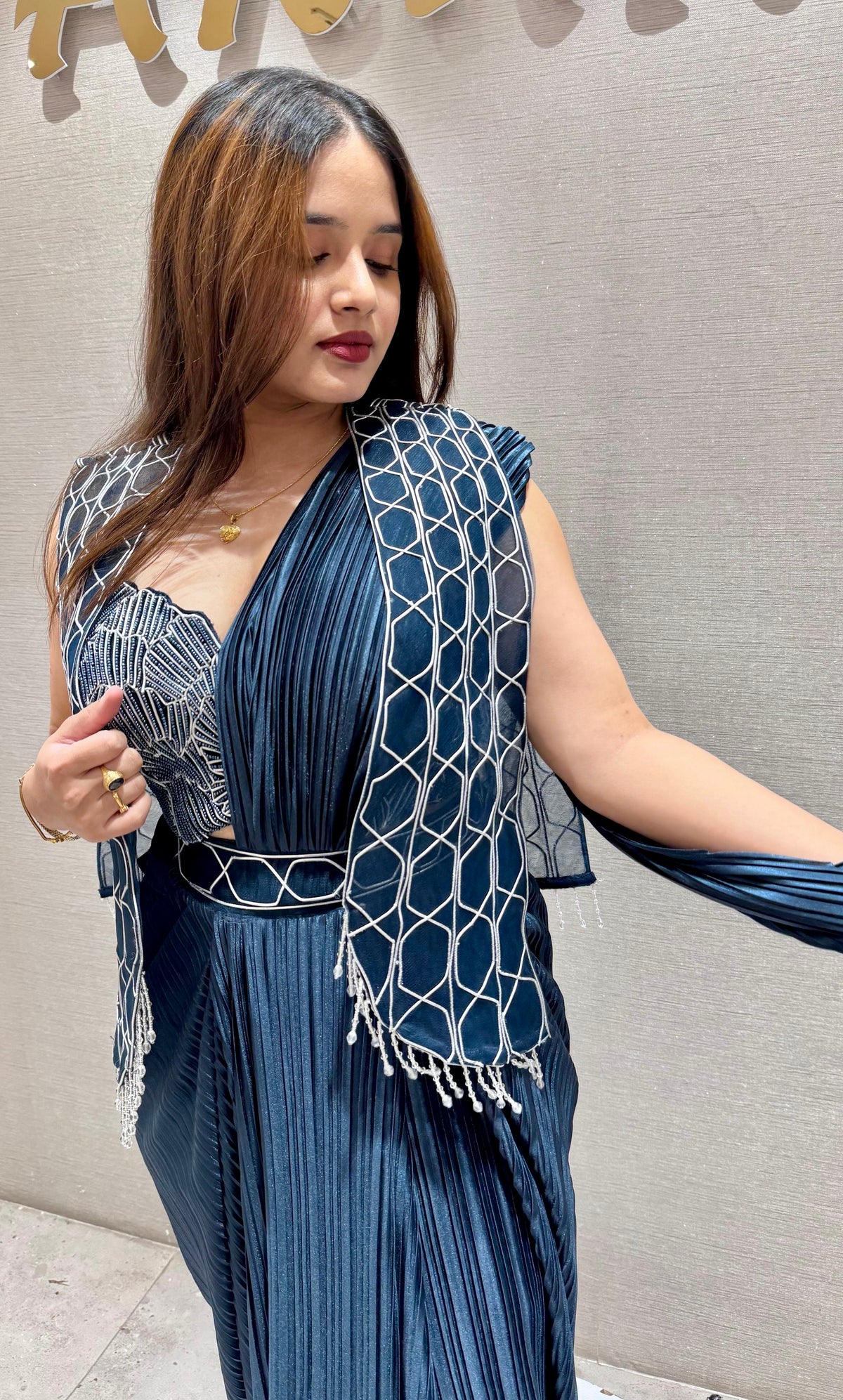 Peacock blue drape saree with Cape