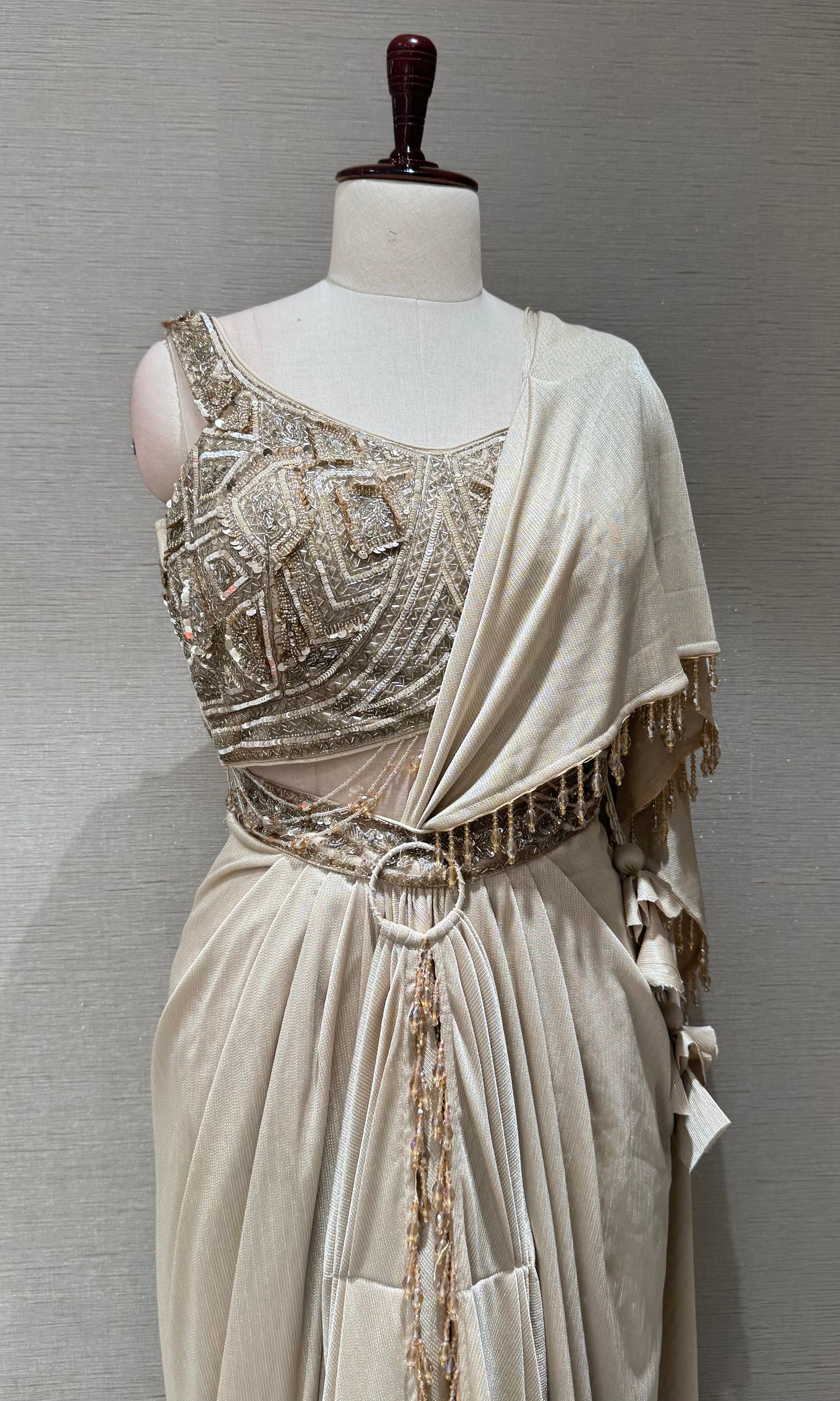 Beige & Gold Draped saree with Embellished Corset