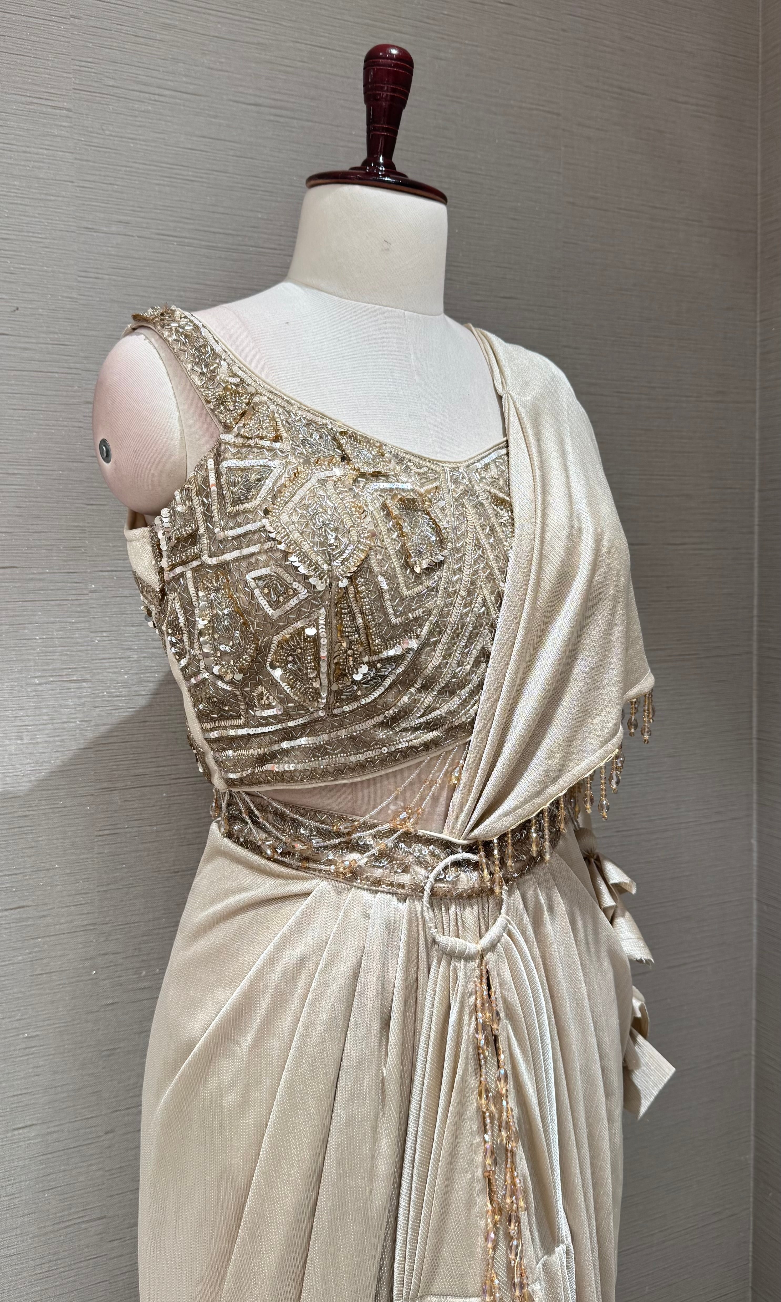 Beige & Gold Draped saree with Embellished Corset