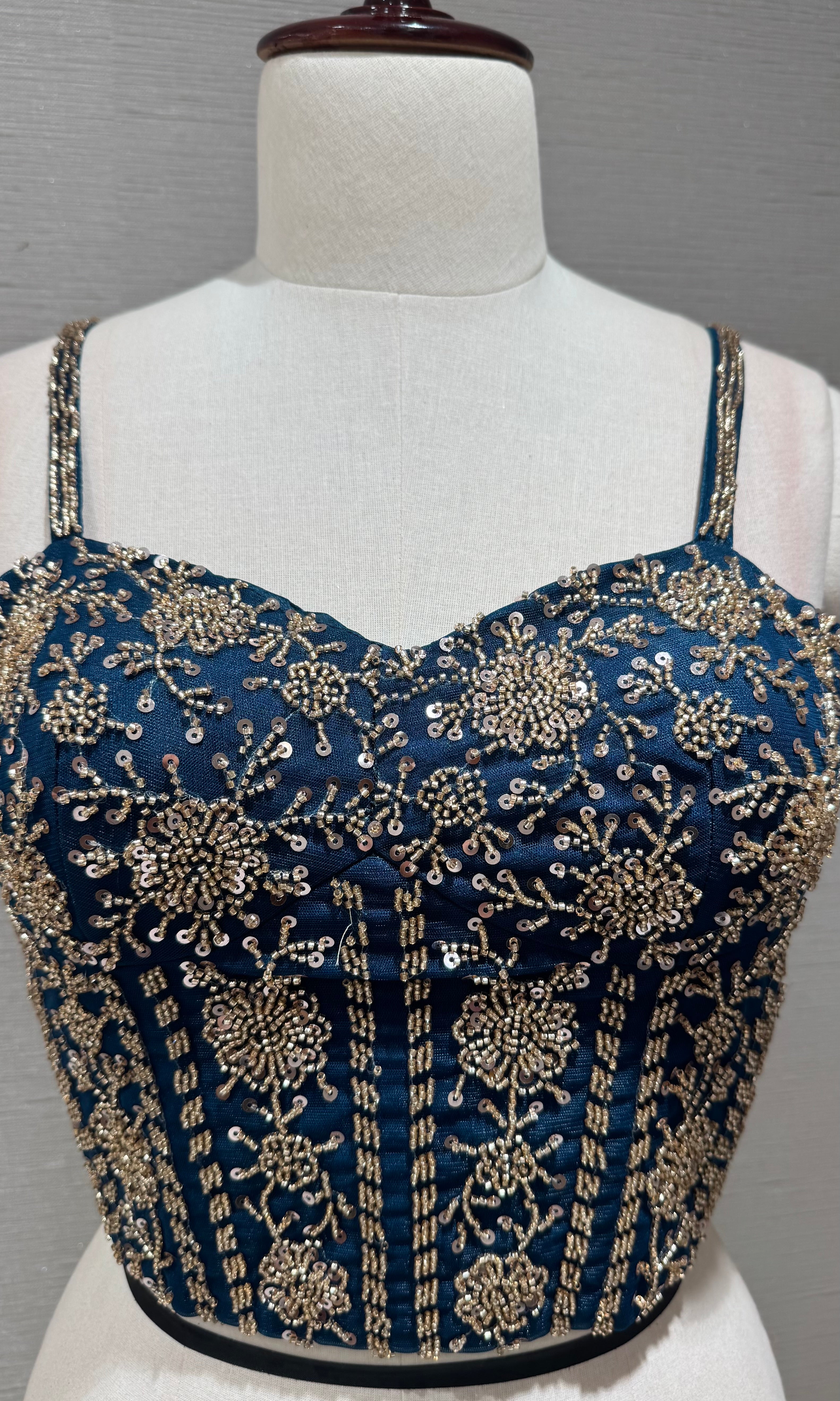 Blue Drape saree with embellished corset blouse