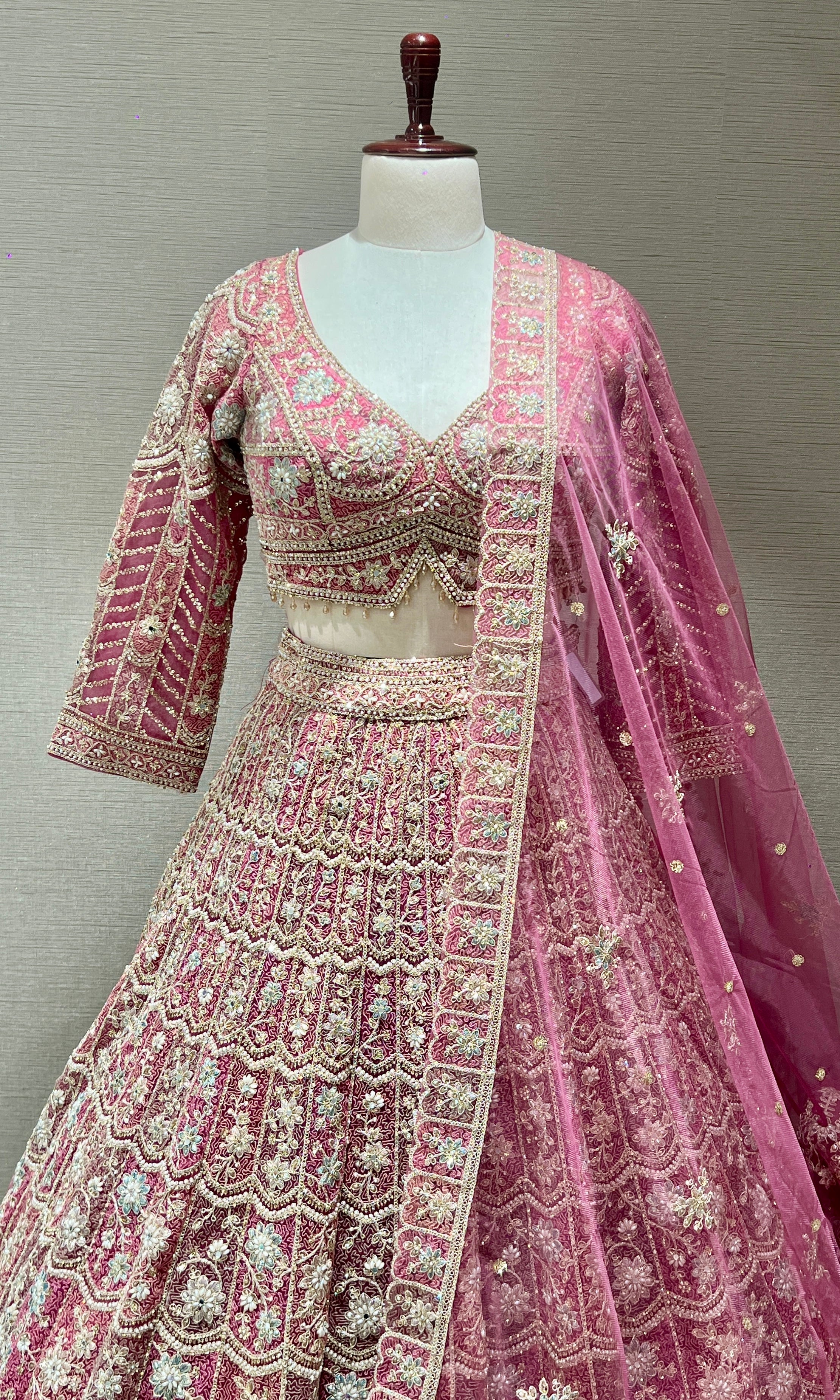 Pink lehenga with intricate embroidery and zari work
