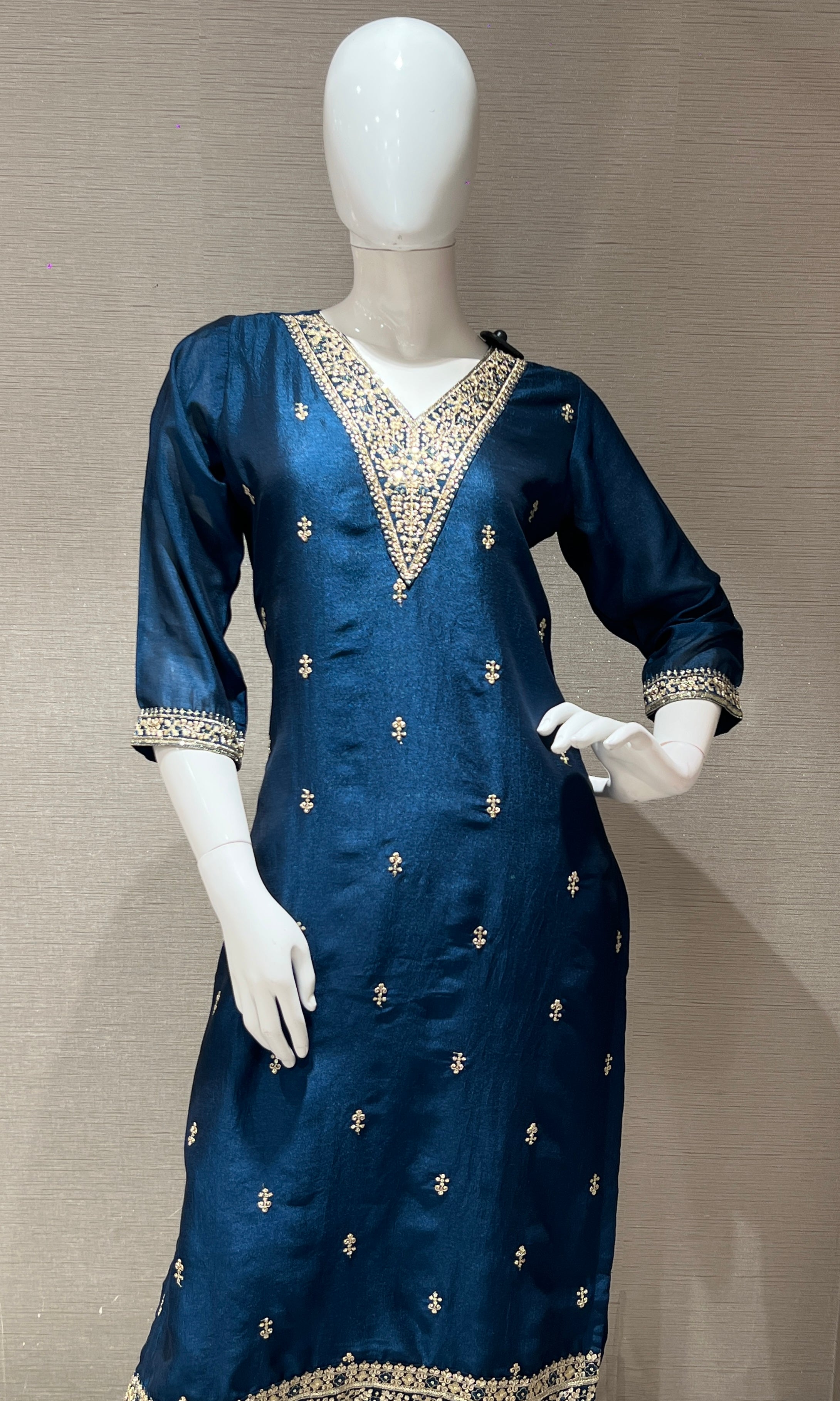 peacock blue kurta set with gold duppatta