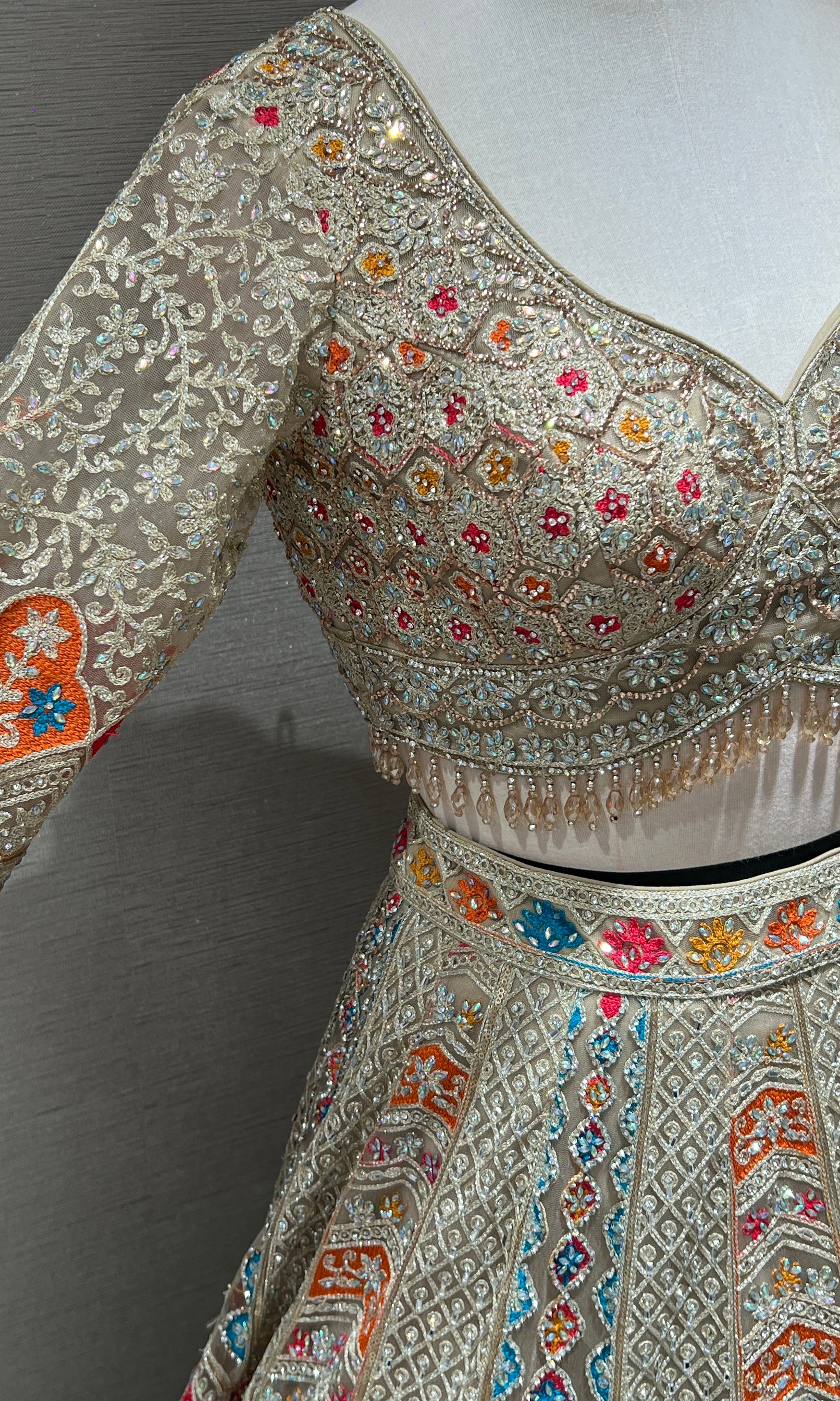 Chikoo Lehenga with Multi Color intricate embroidery