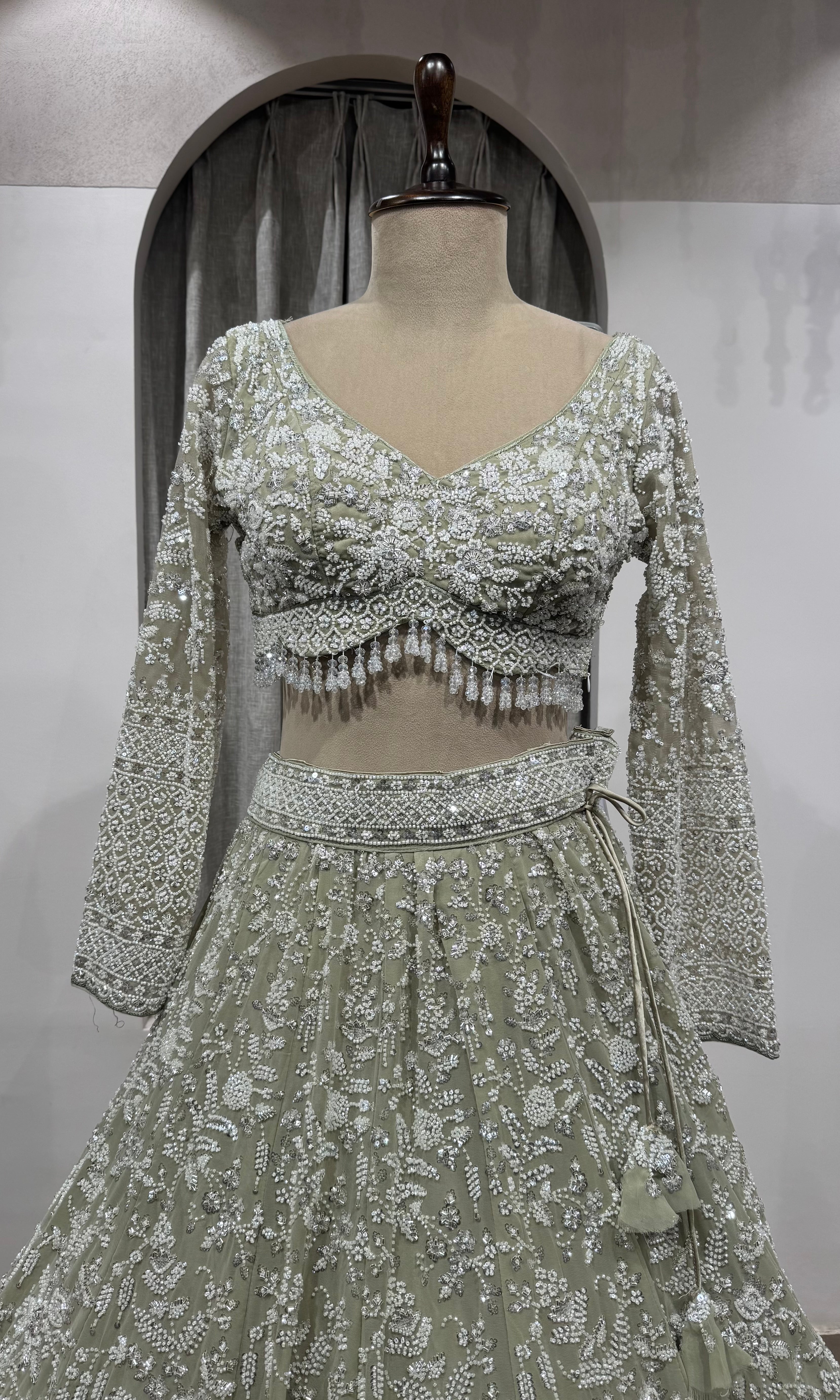 Sage Green Heavily Embroidered Net Bridal Lehenga