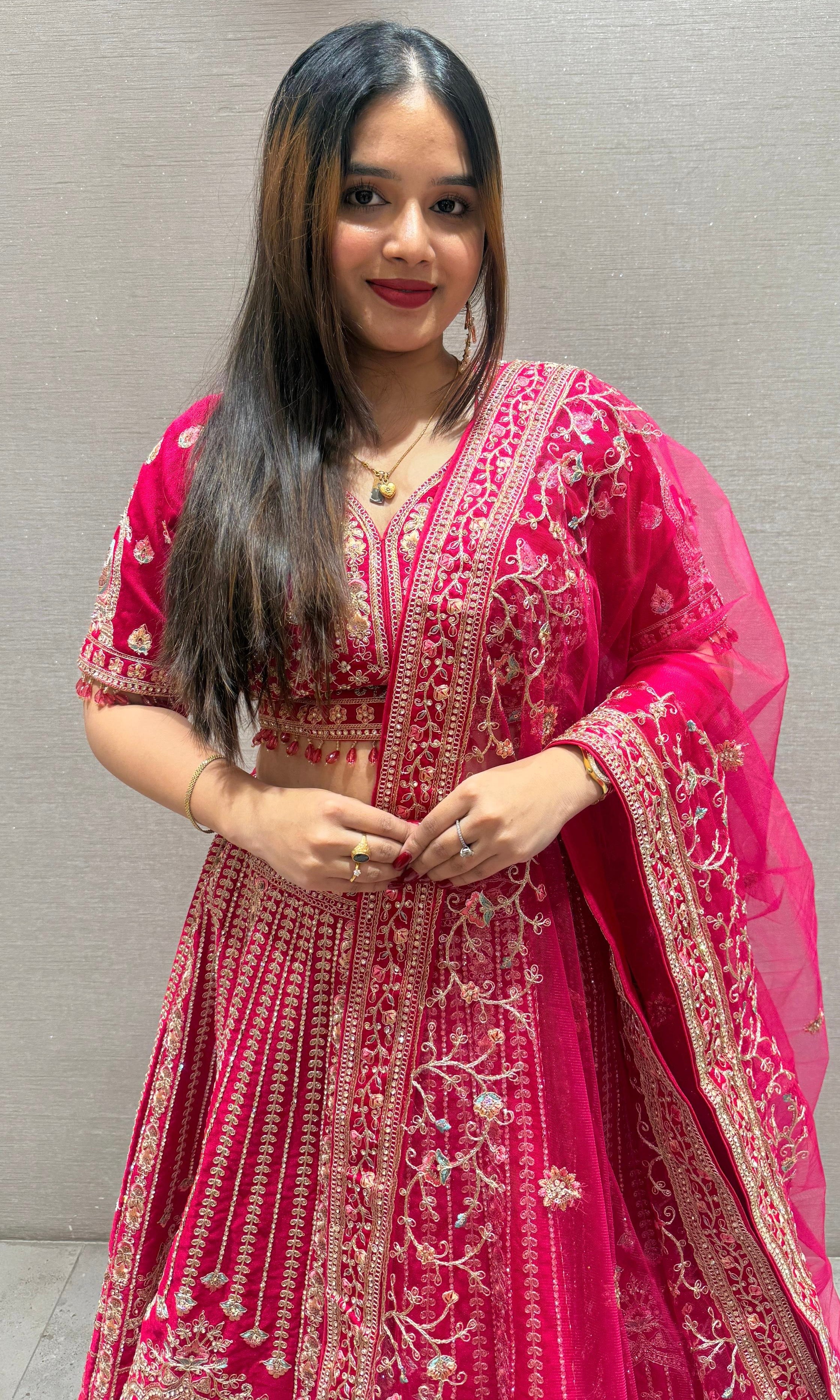 Rani pink Lehenga with gold embroidered