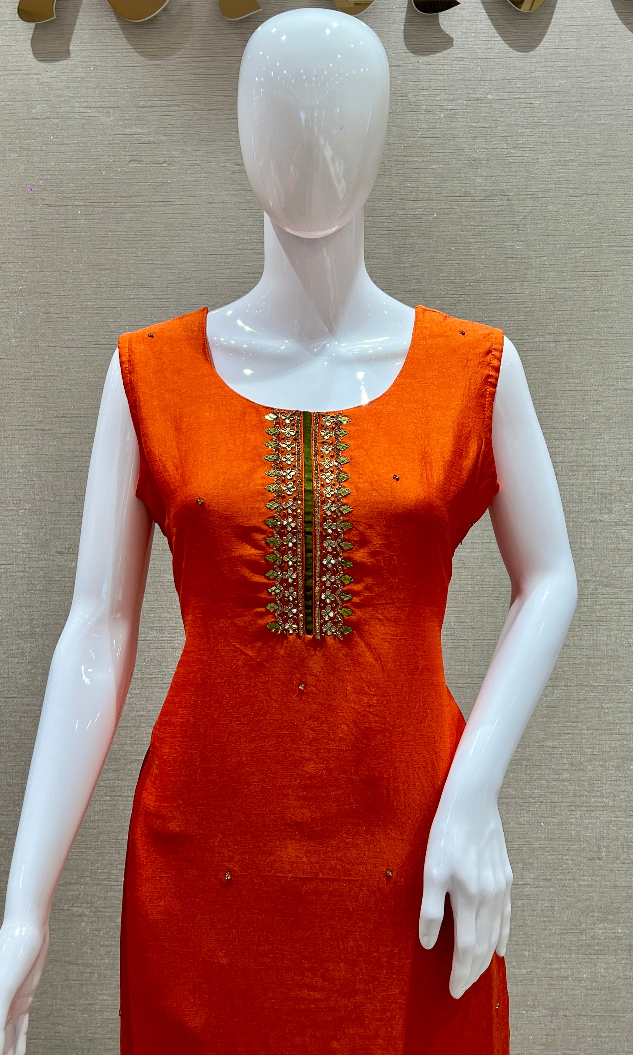 Orange kurta set with green Contrast dupatta
