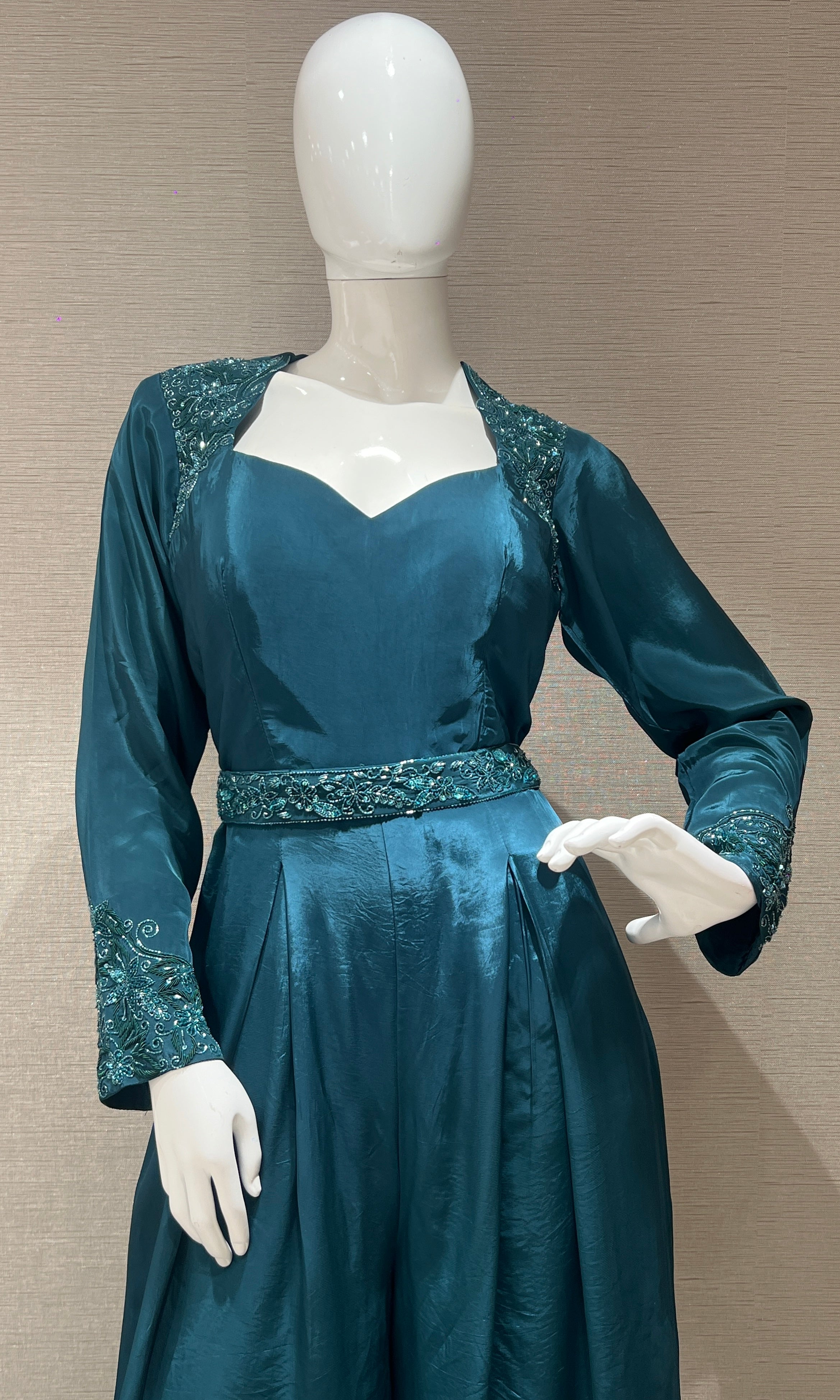 Green jumpsuit with belt