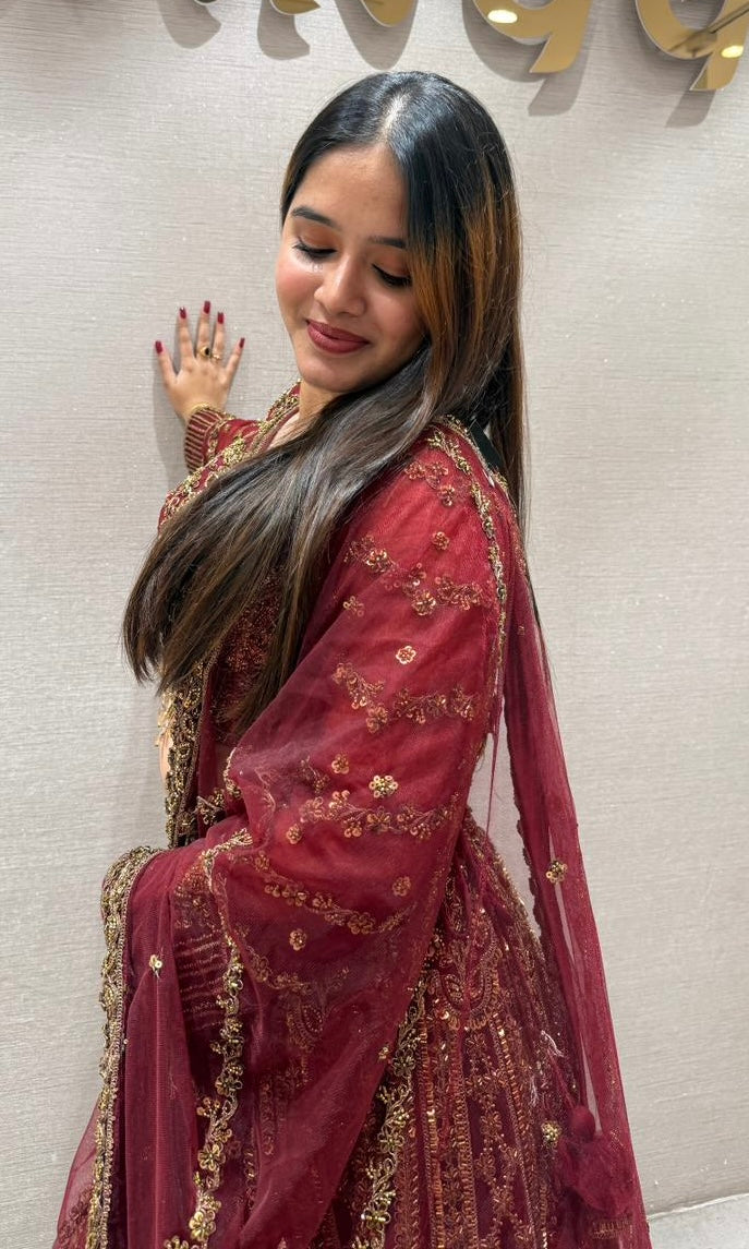 Deep red and gold lehenga