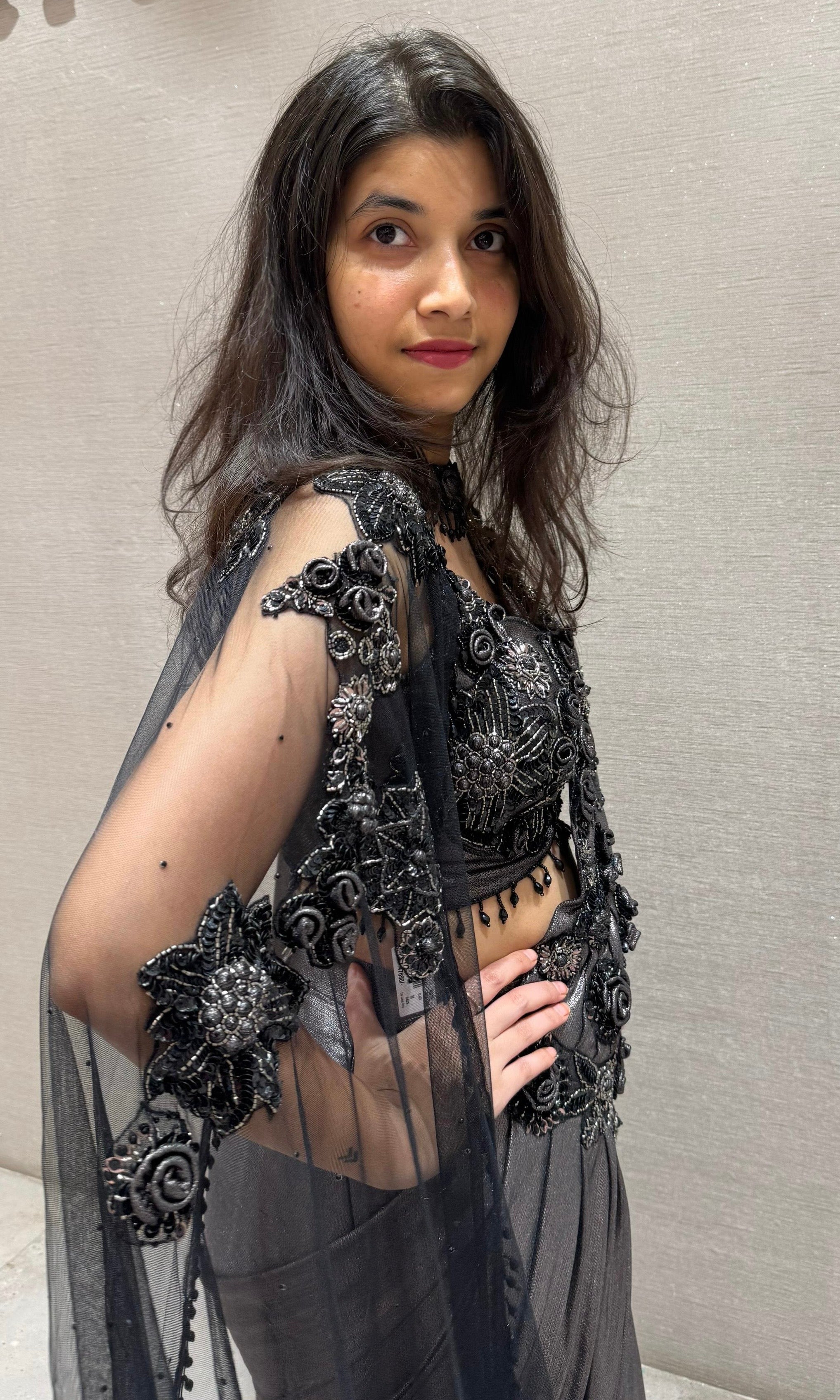 Black sequin drape saree with sheer cape