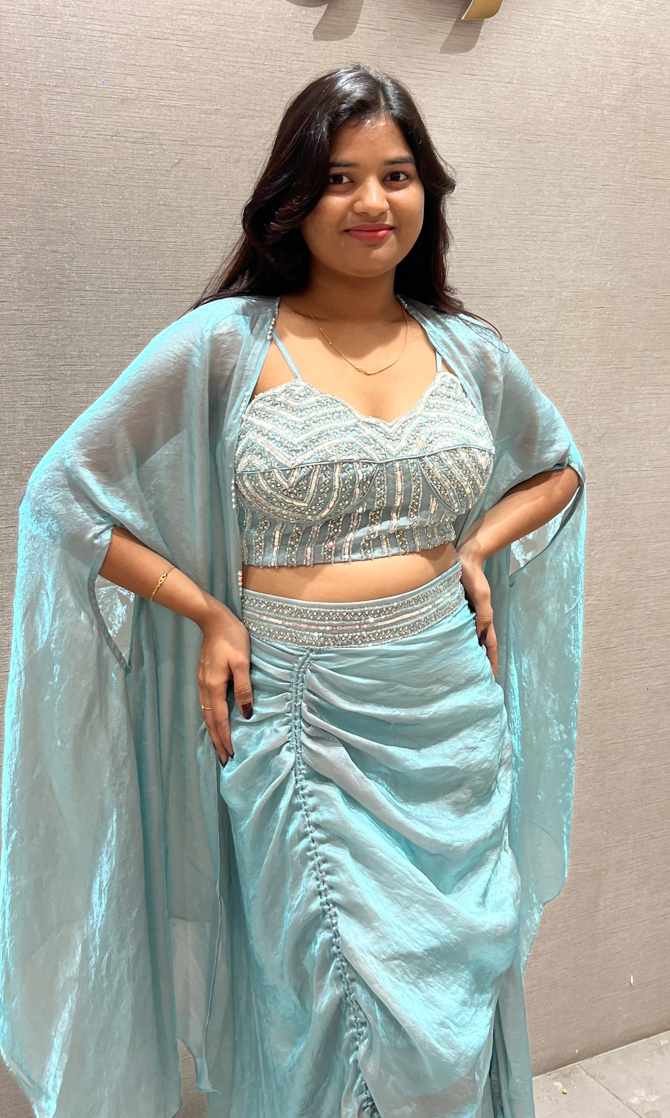 Aqua blue draped saree with Crystal Blouse