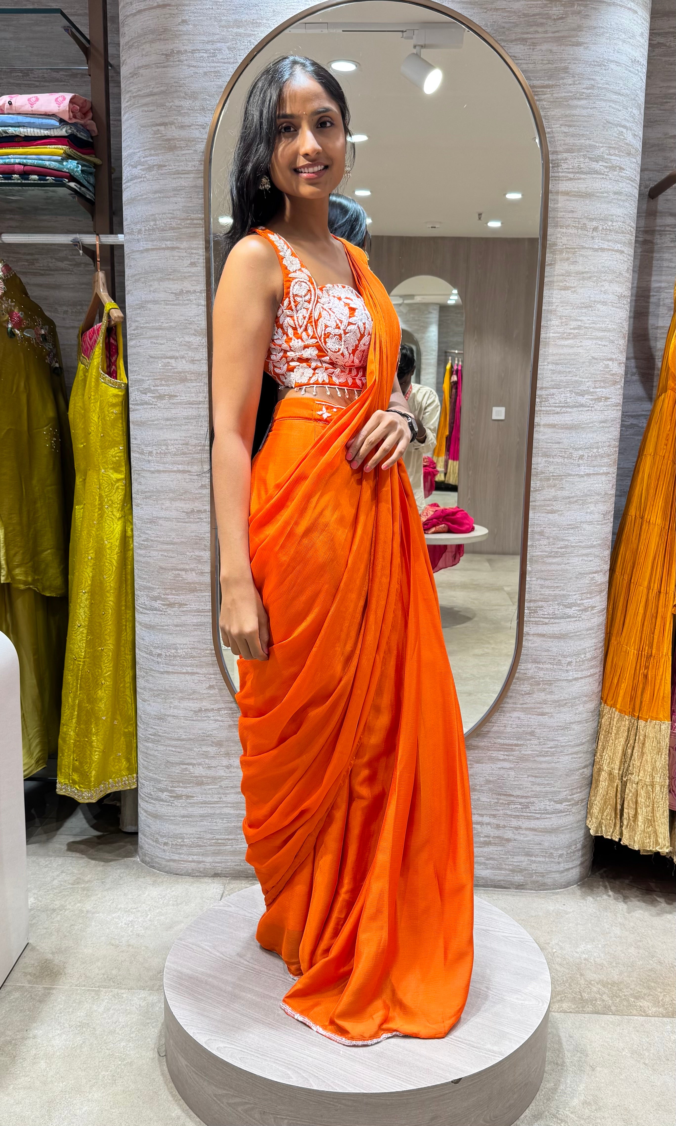 ORANGE DRAPE SAREE WITH CORSET BLOUSE