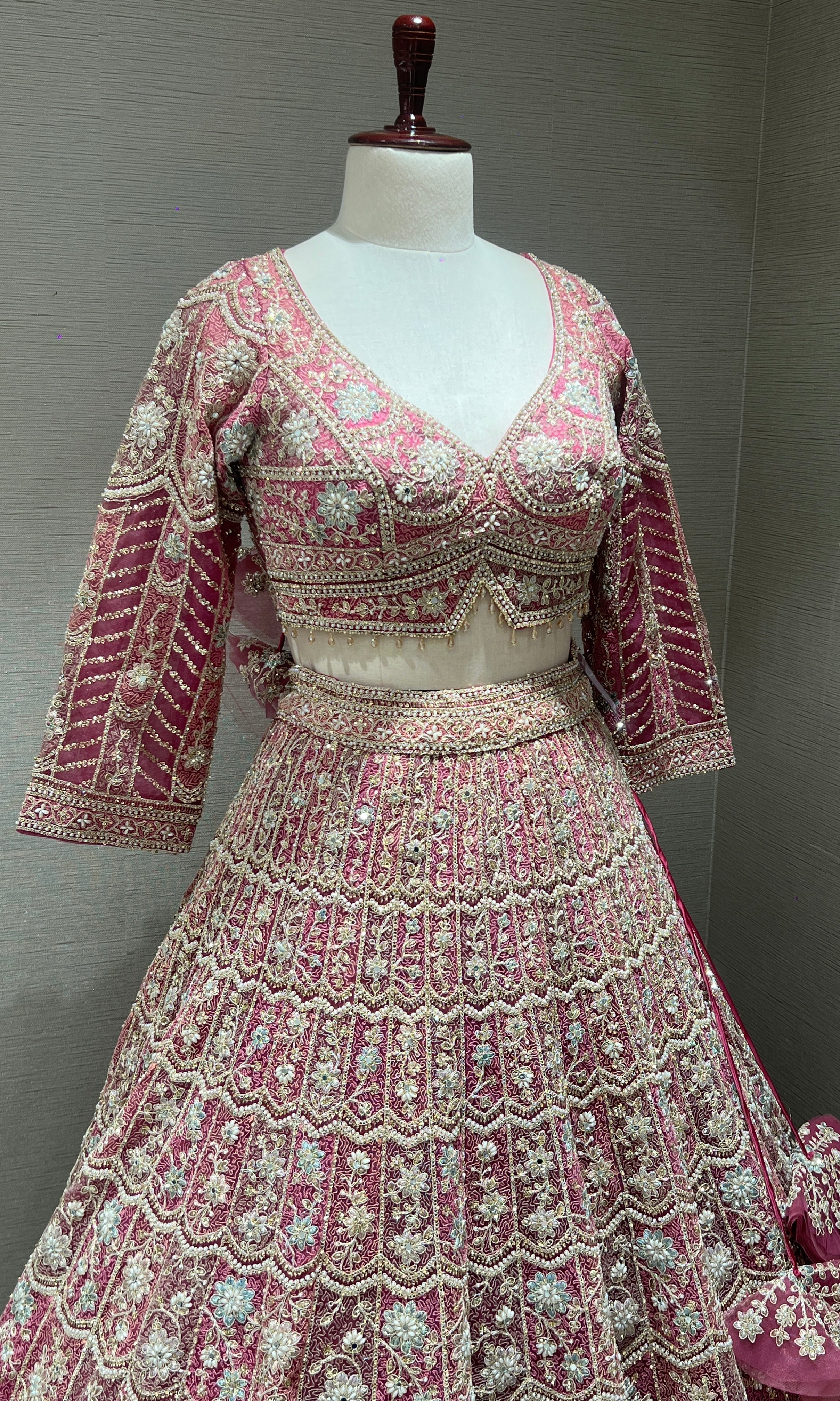 Pink lehenga with intricate embroidery and zari work