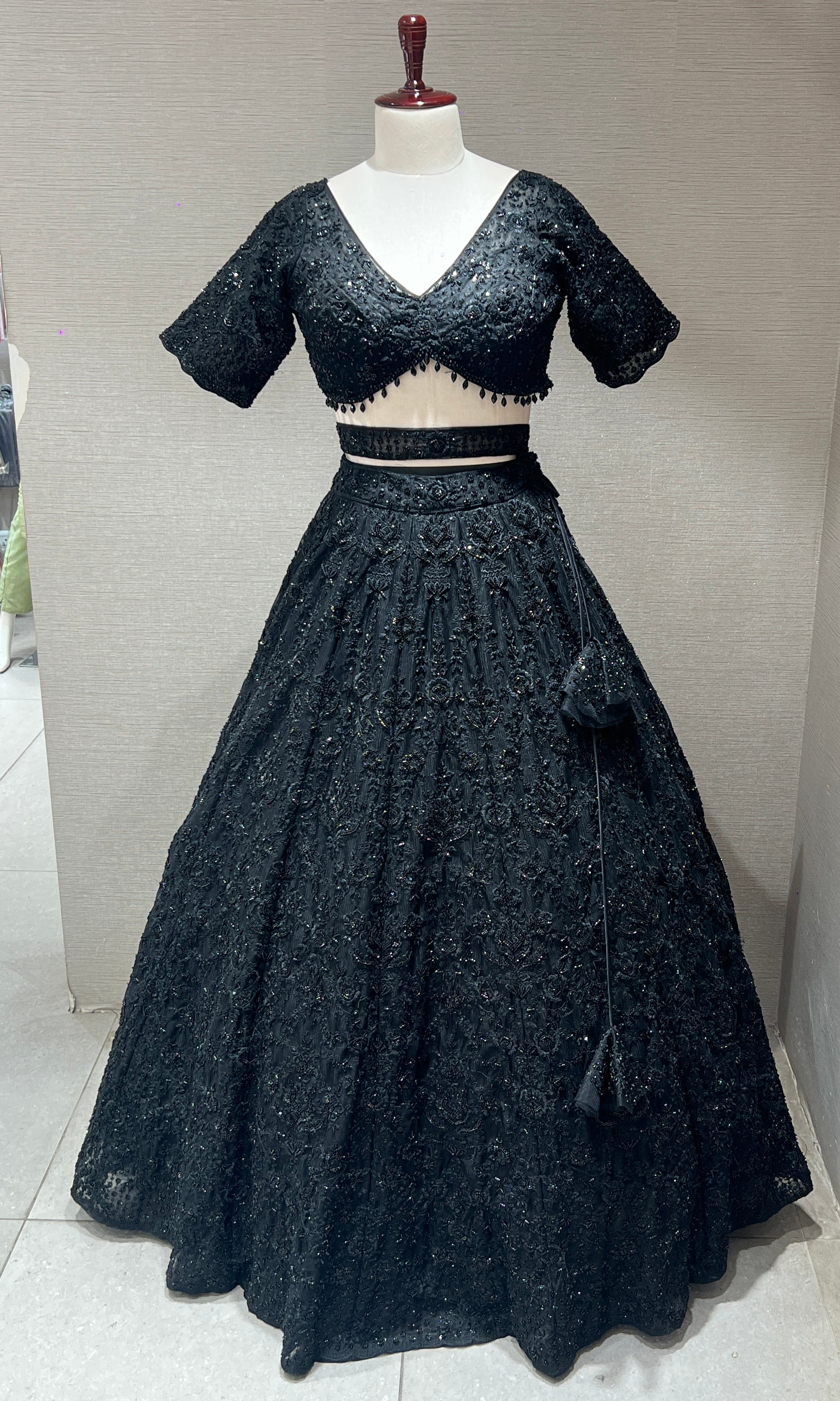Black lehenga with pretty blouse and netted dupatta