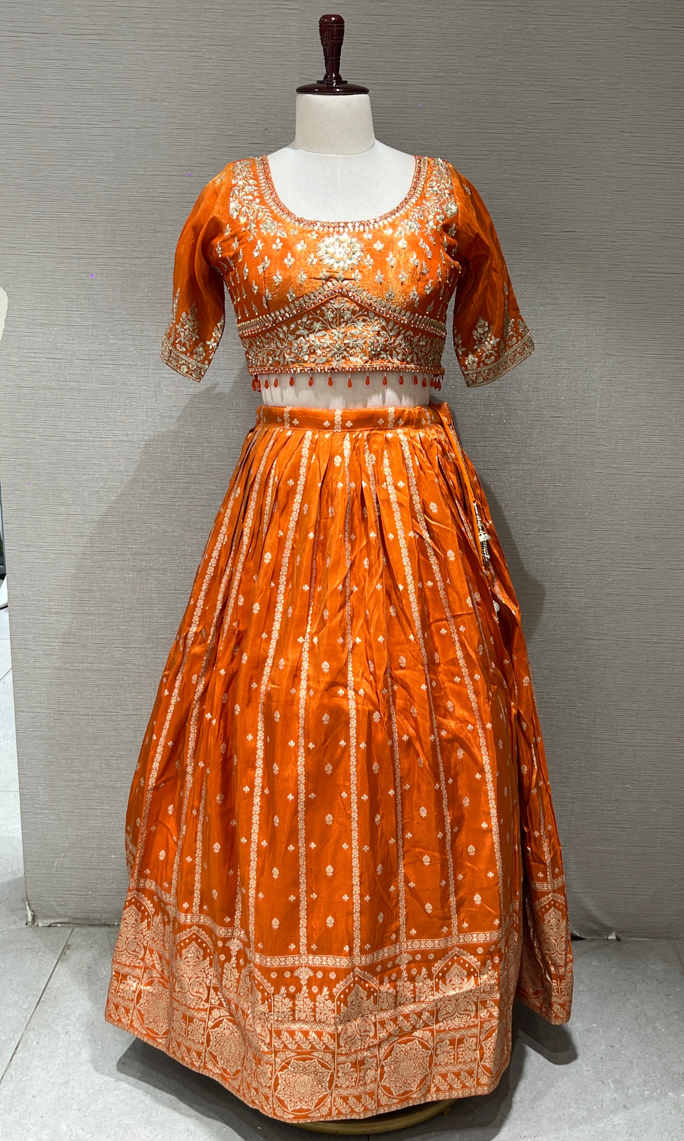 Orange Lehenga with Golden embroidery