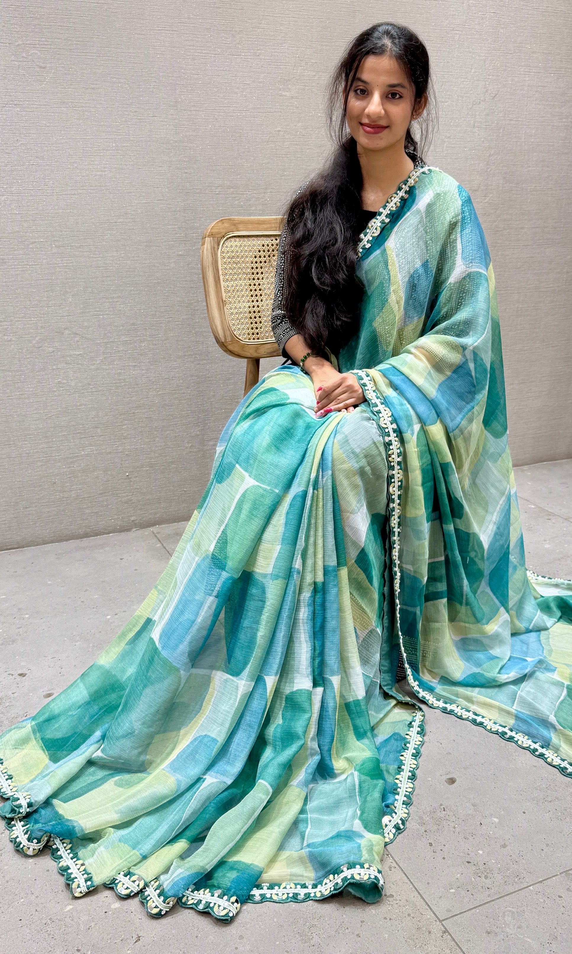 Green and blue Crushed Georgette saree with ready blouse
