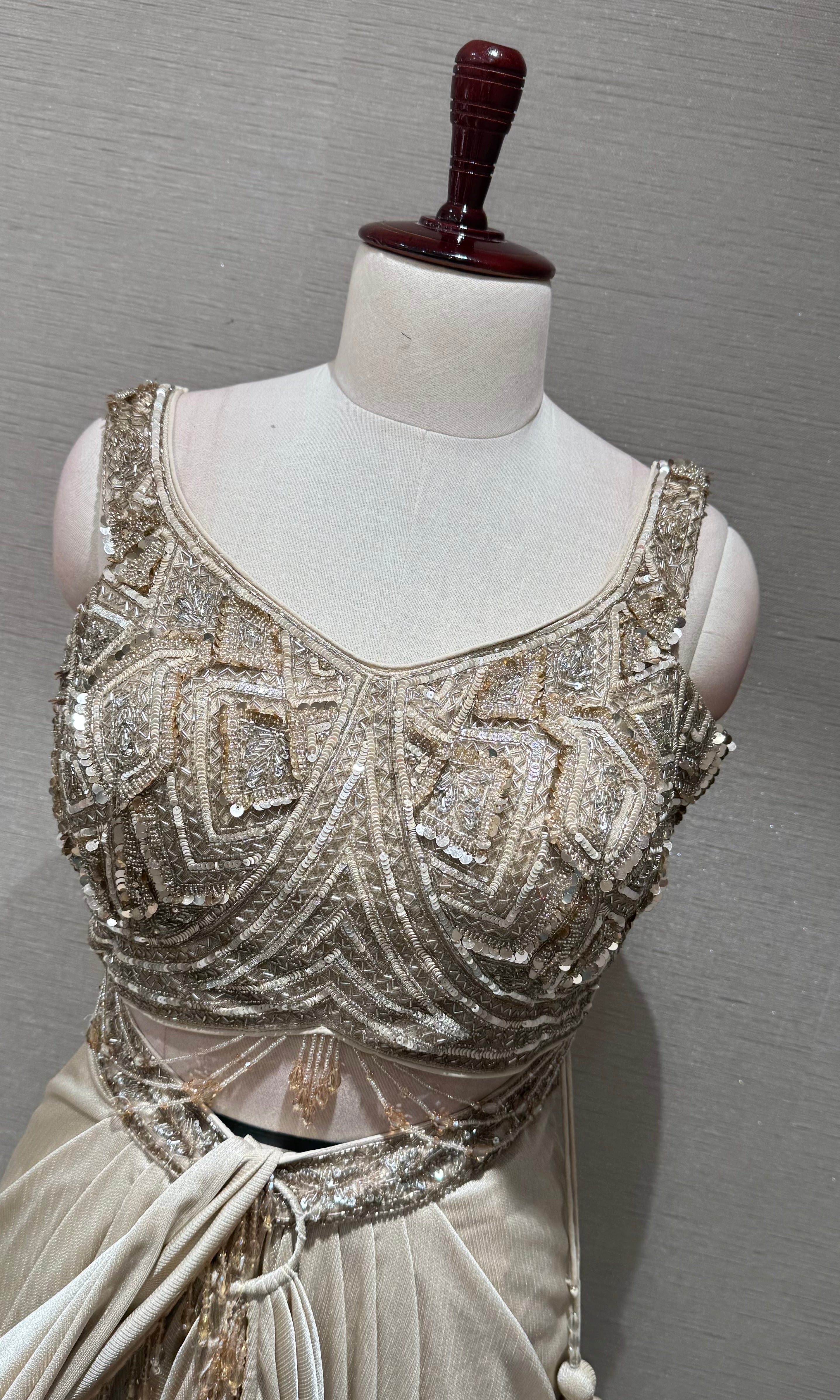 Beige & Gold Draped saree with Embellished Corset
