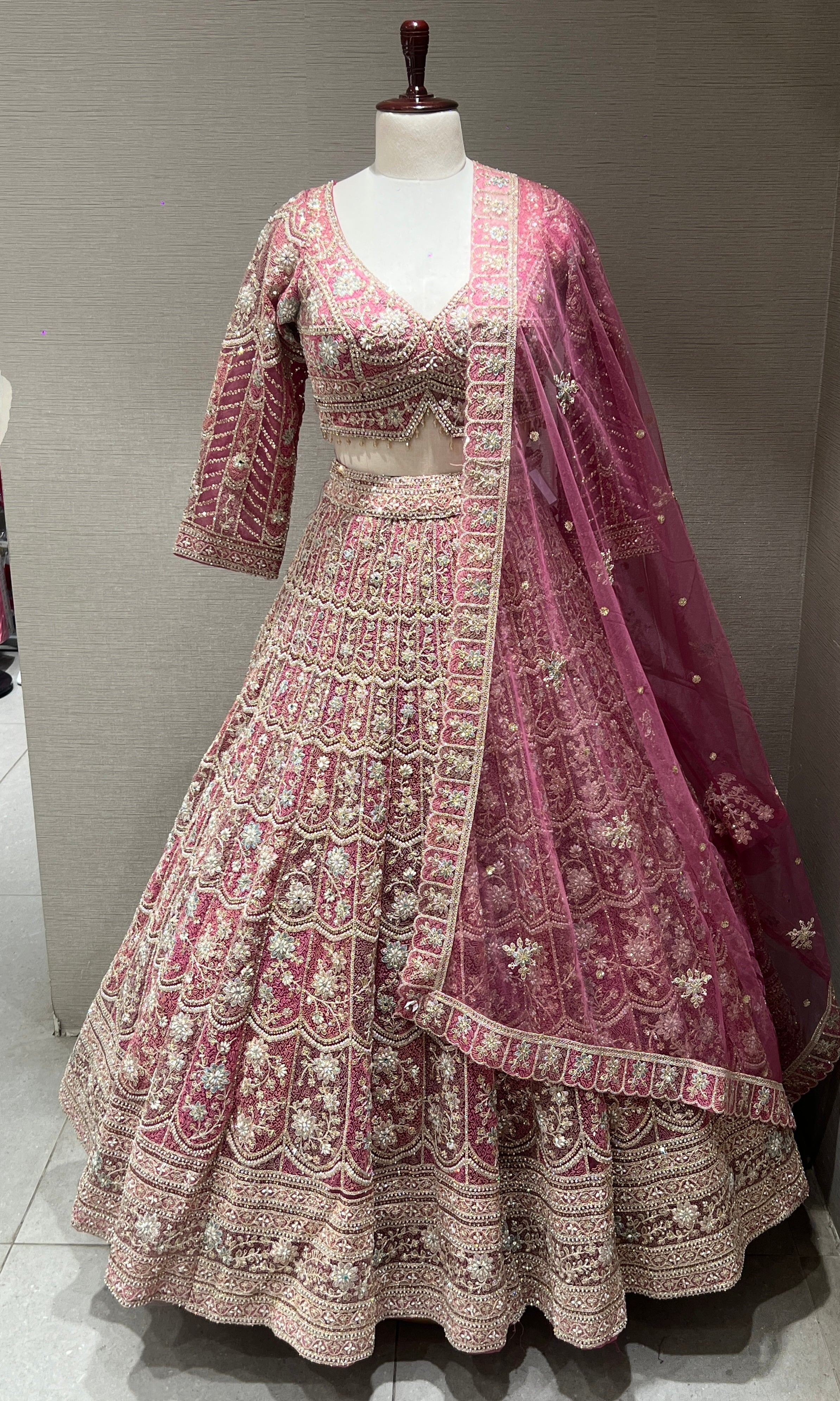Pink lehenga with intricate embroidery and zari work