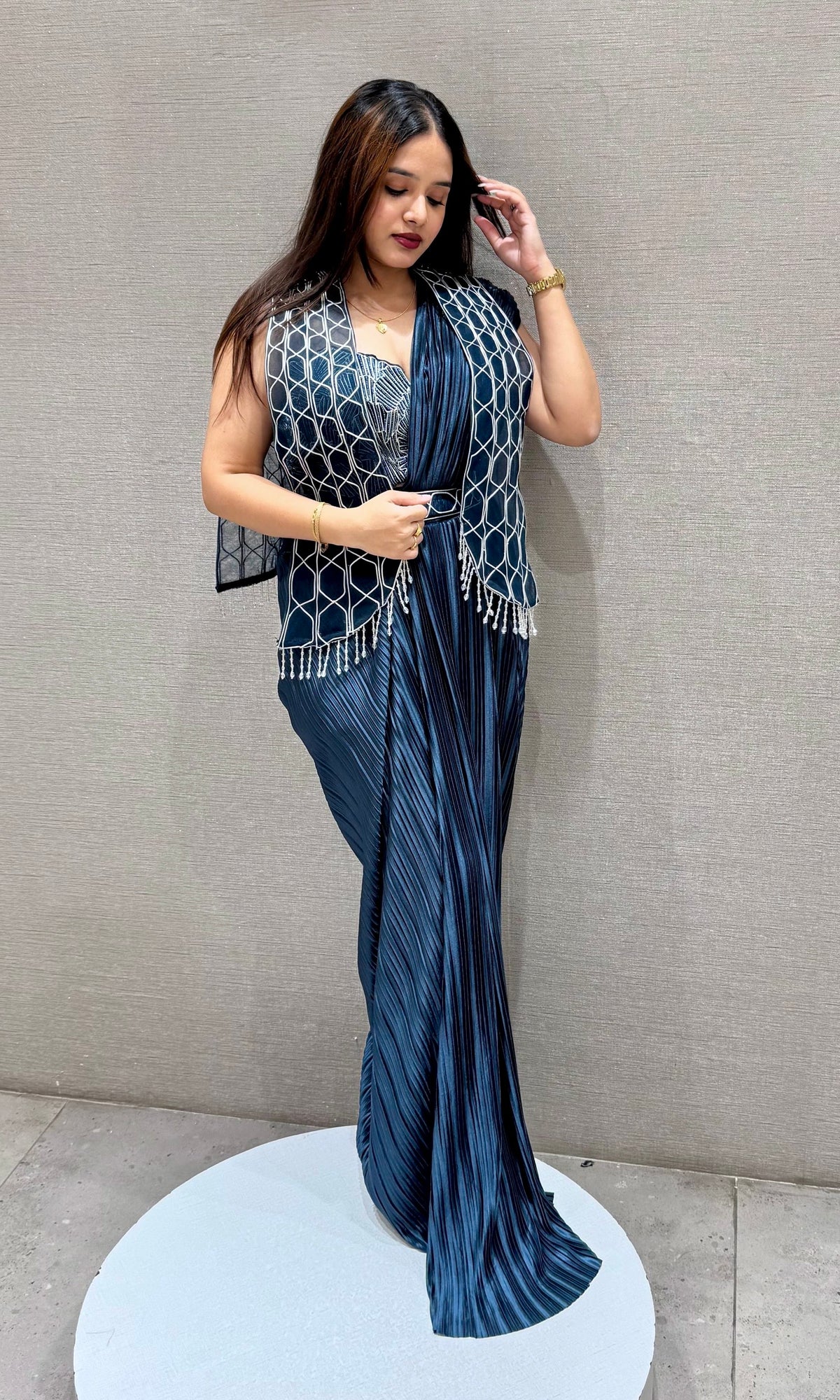 Peacock blue drape saree with Cape