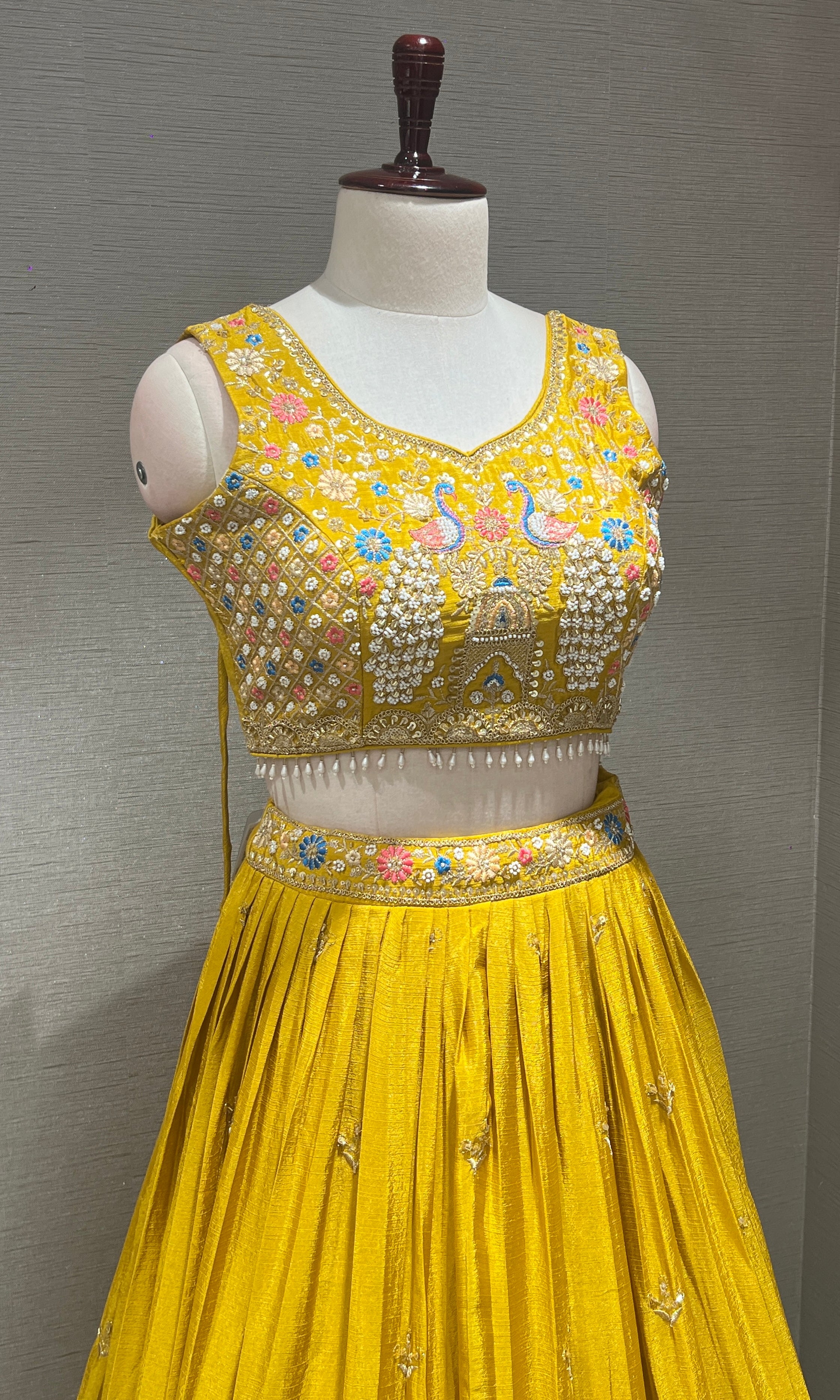 Yellow peacock embroidered Lehenga