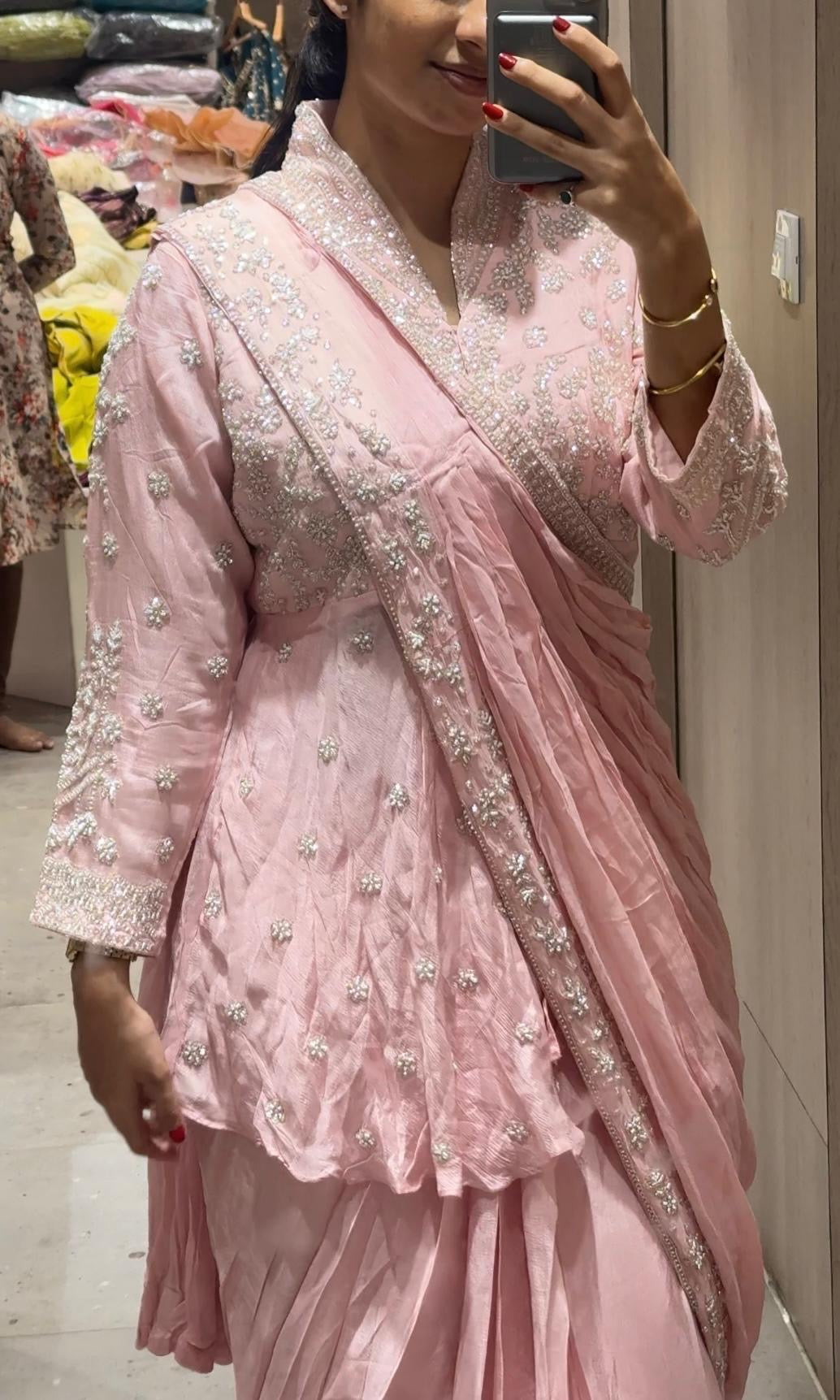 Pink pre drape saree with intricate stone work