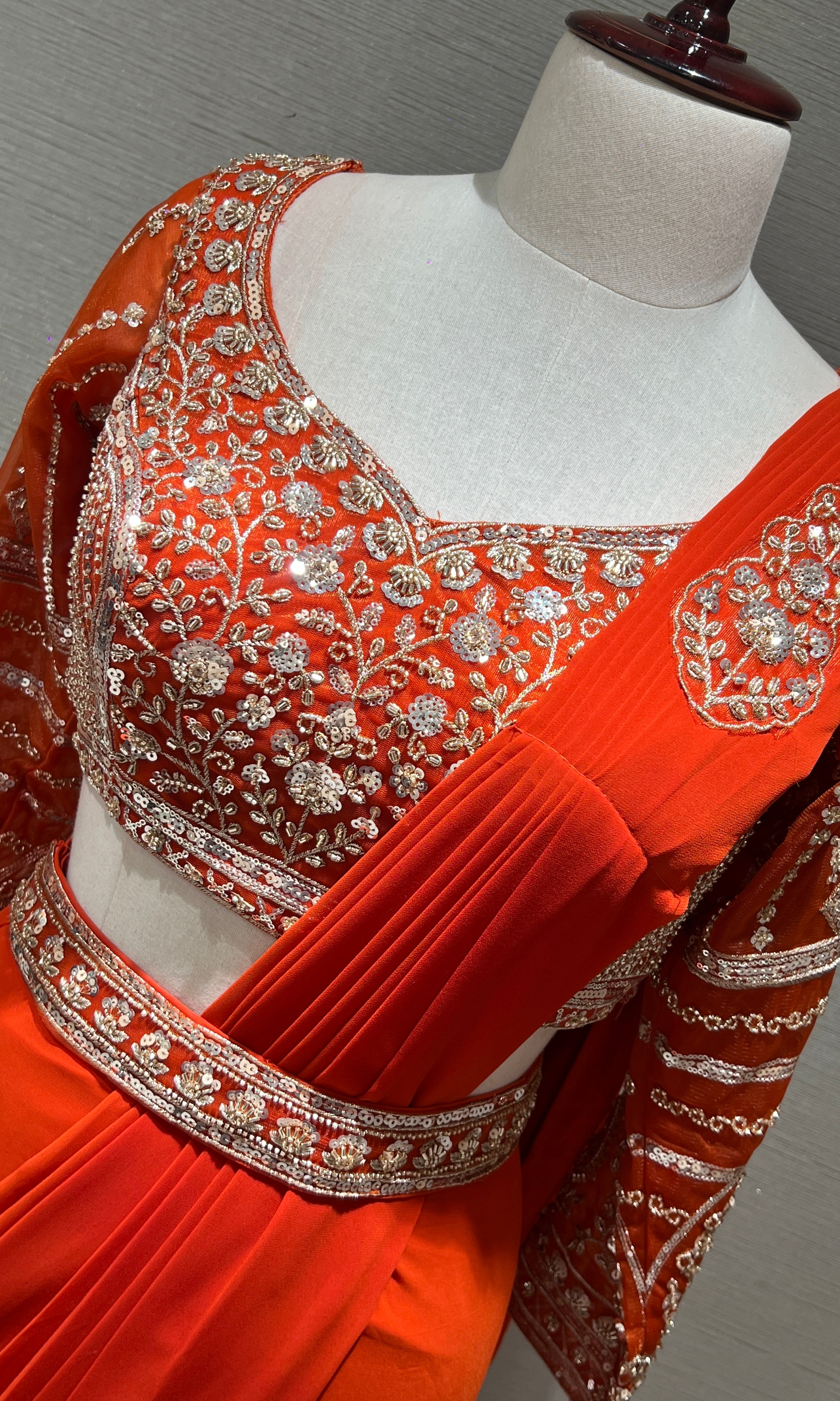 ORANGE drape saree with embellished blouse